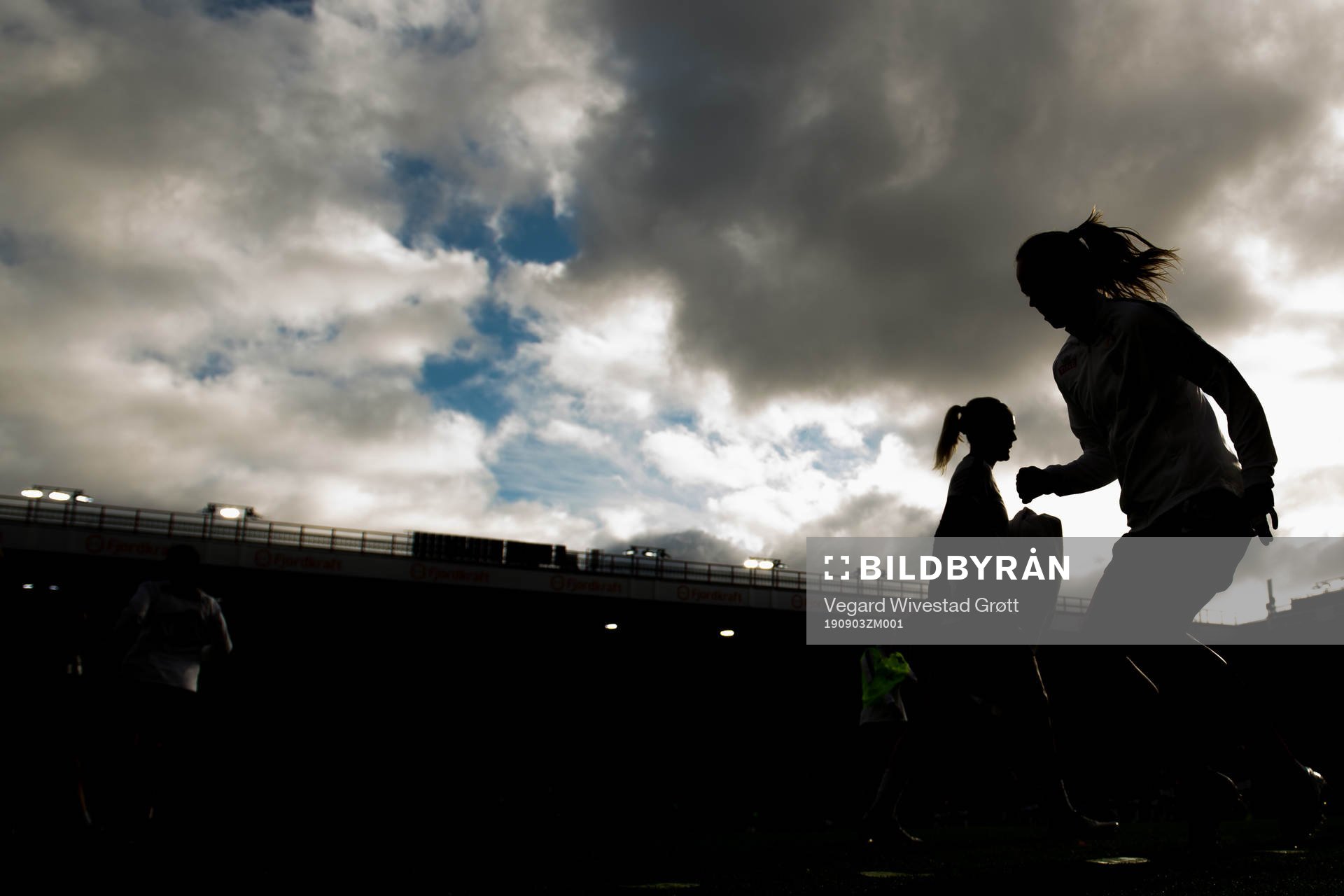 The silhouettes of goalkeeper Ingrid Hjelmseth and Caroline Graham Hansen of Norway ahead of the women's international friendly football match between Norway and England on September 3, 2019 in Bergen.