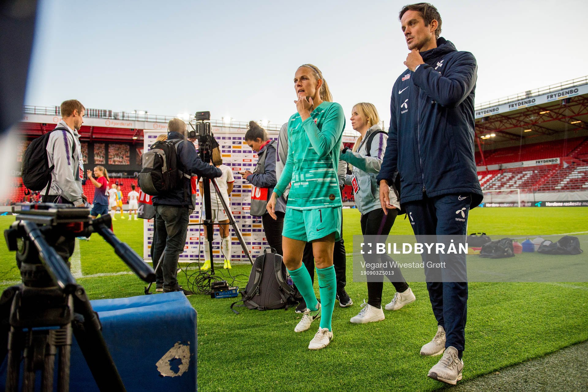 Goalkeeper Ingrid Hjelmseth of Norway and Terje Skeie, head