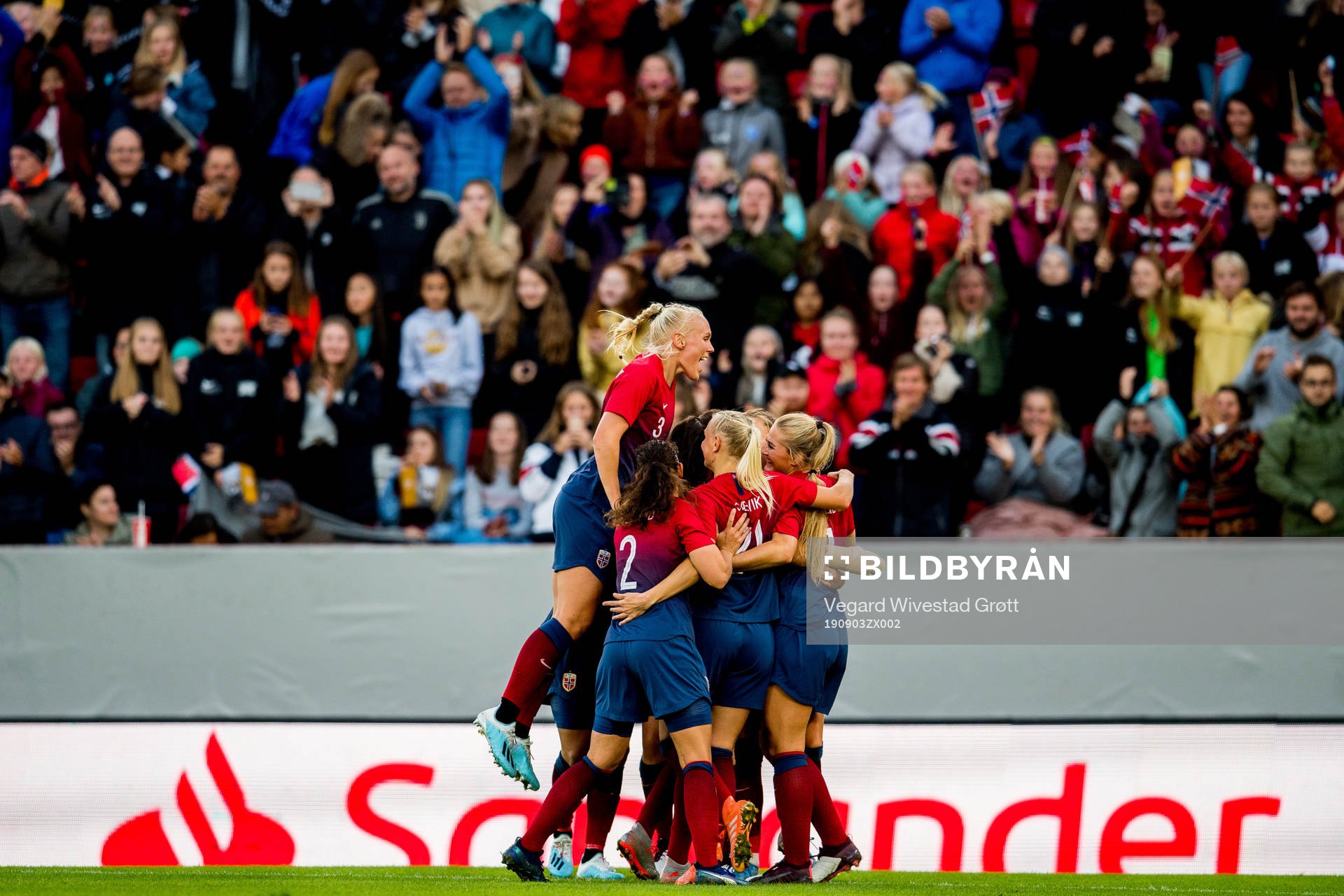 Caroline Graham Hansen of Norway celebrates with teammates Maria Thorisdottir, Ingrid Moe Wold, Karina Sævik and Lisa-Marie Karlseng Utland after scoring 2-1 during the women's international friendly football match between Norway and England on September 3, 2019 in Bergen.