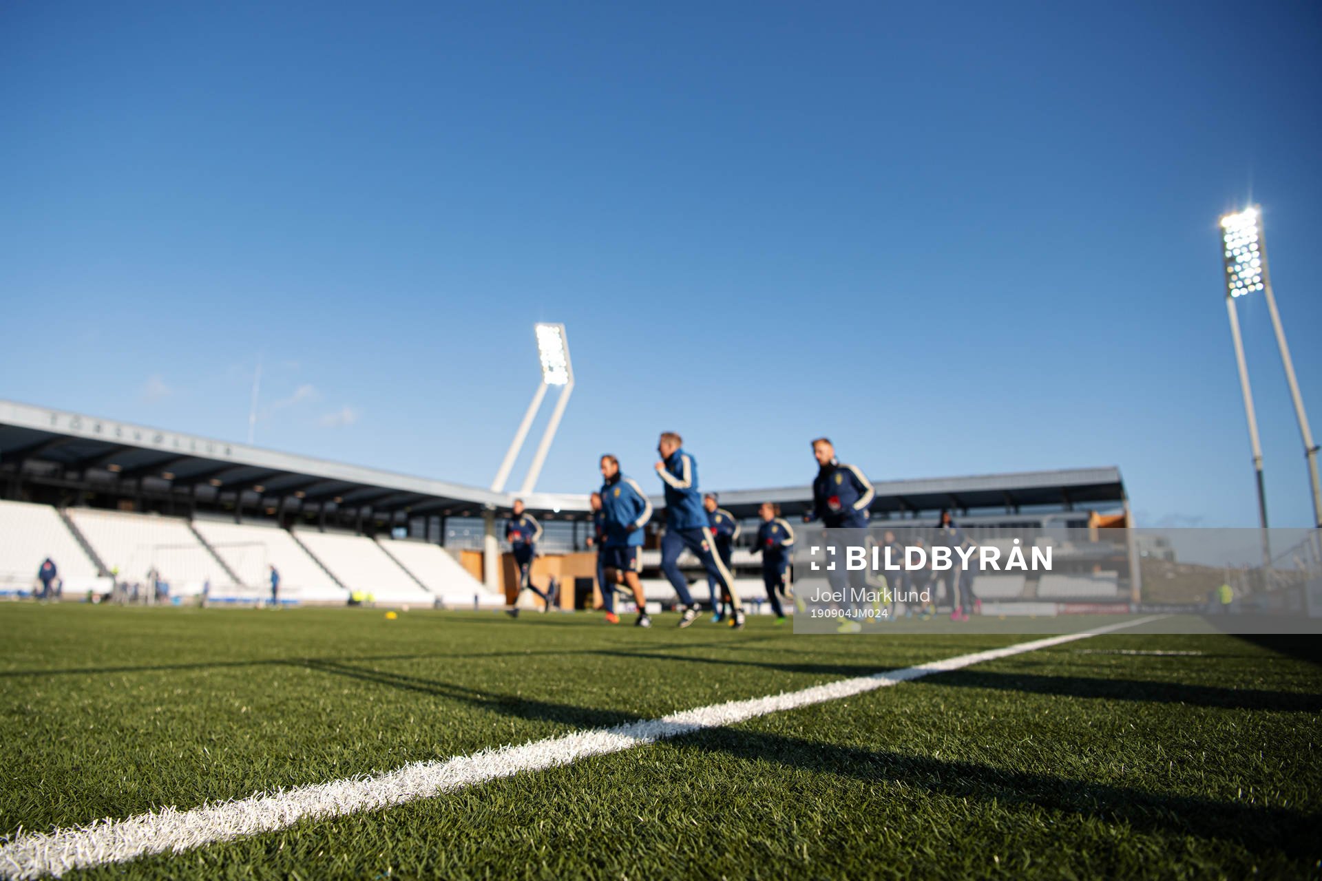 Players of the Swedish national football team warm up at