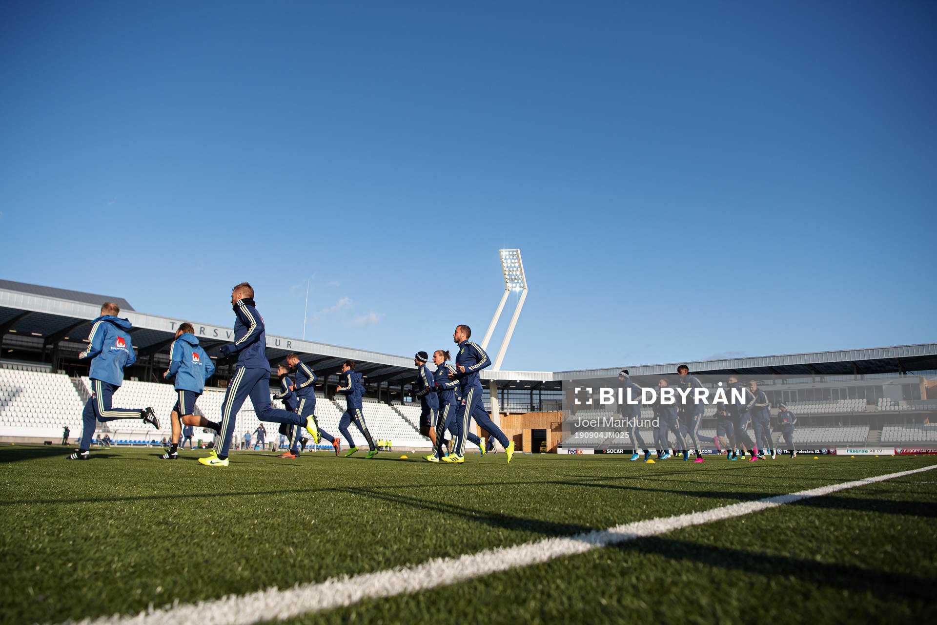 Players of the Swedish national football team warm up