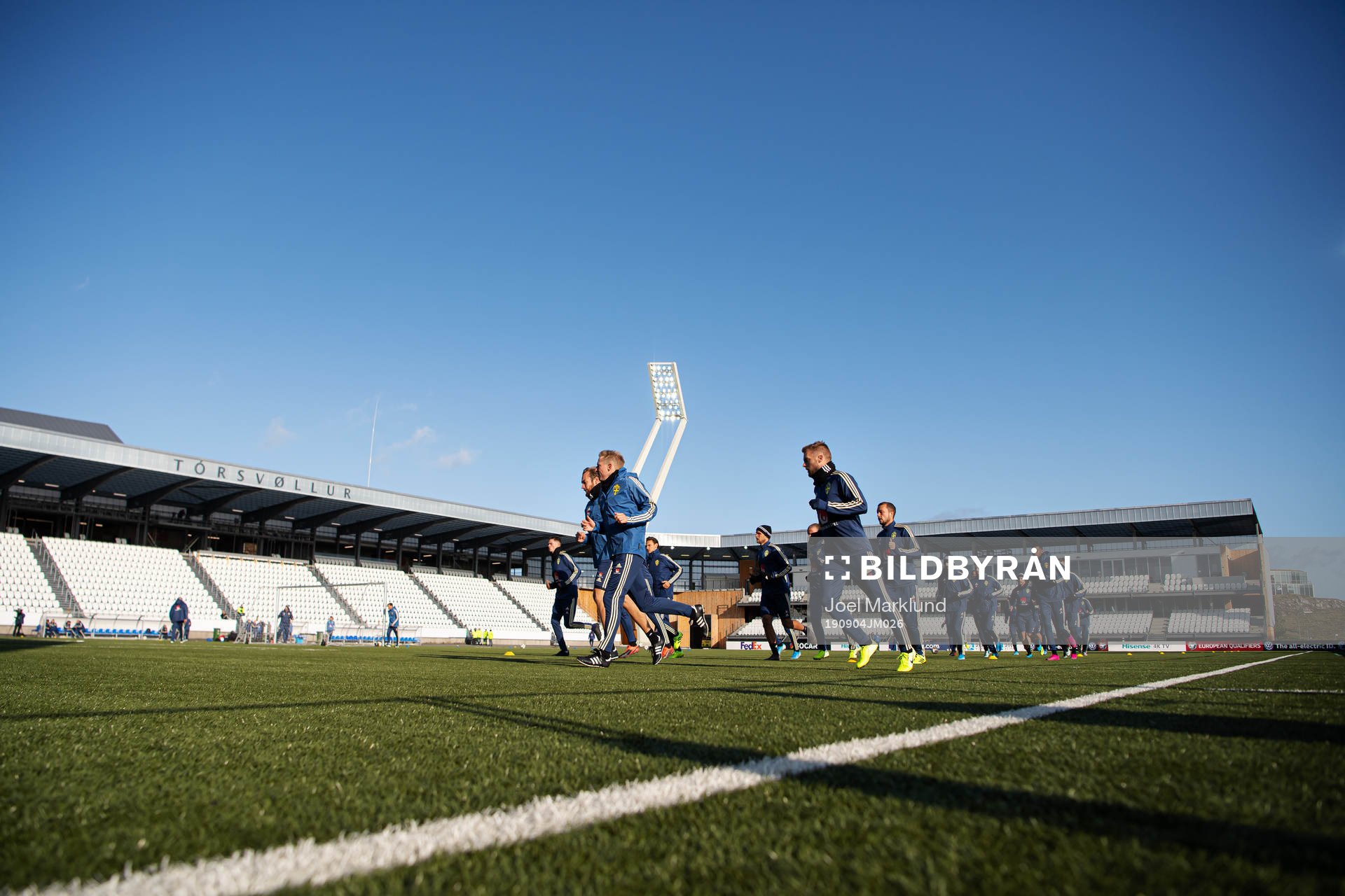 Players of the Swedish national football team warm up