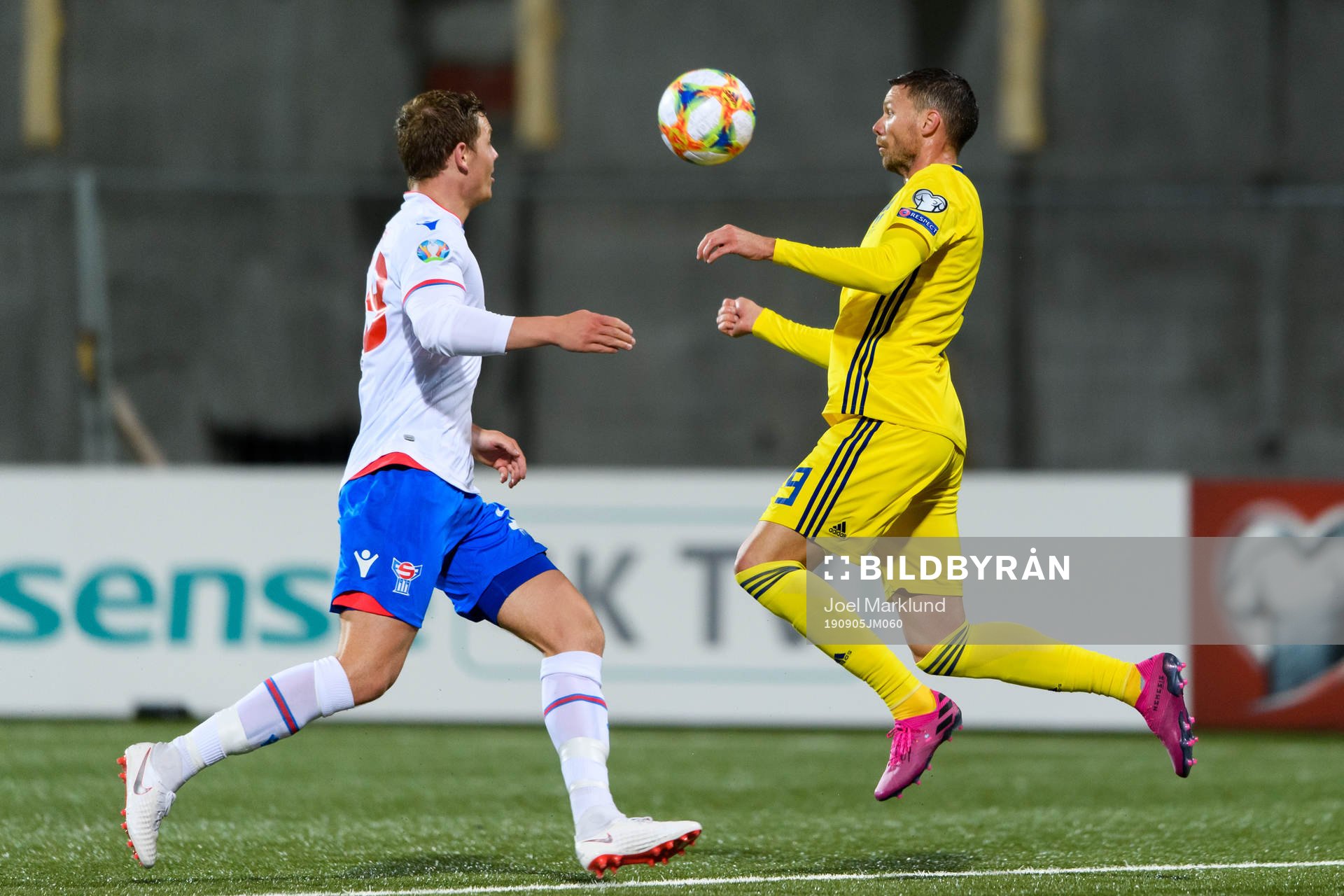 Hørdur Askham of Faroe Islands and Marcus Berg of Sweden