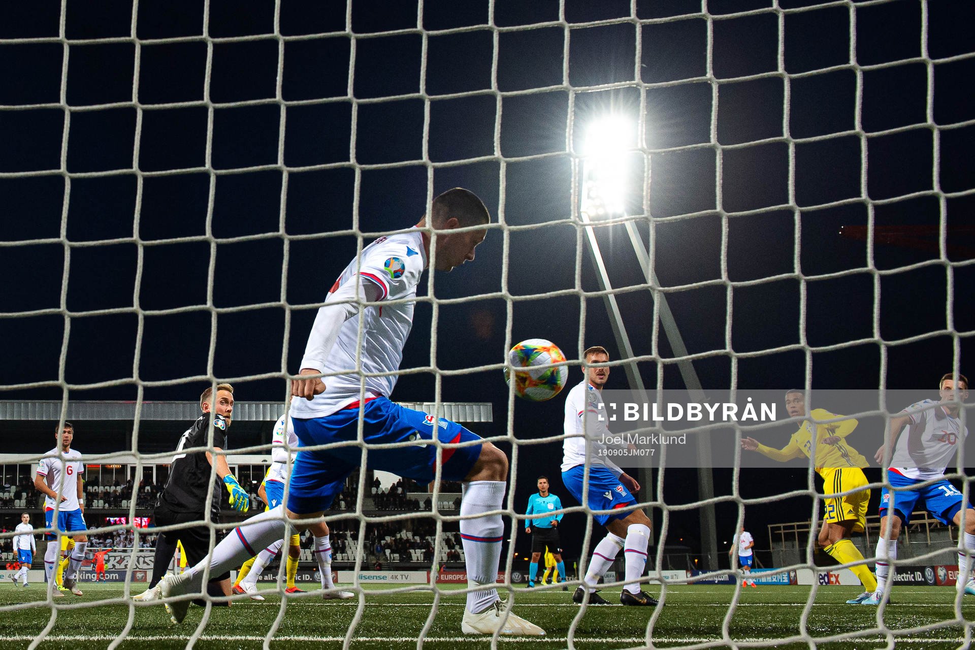 Atli Gregersen of Faroe Islands saves a shot from Robin