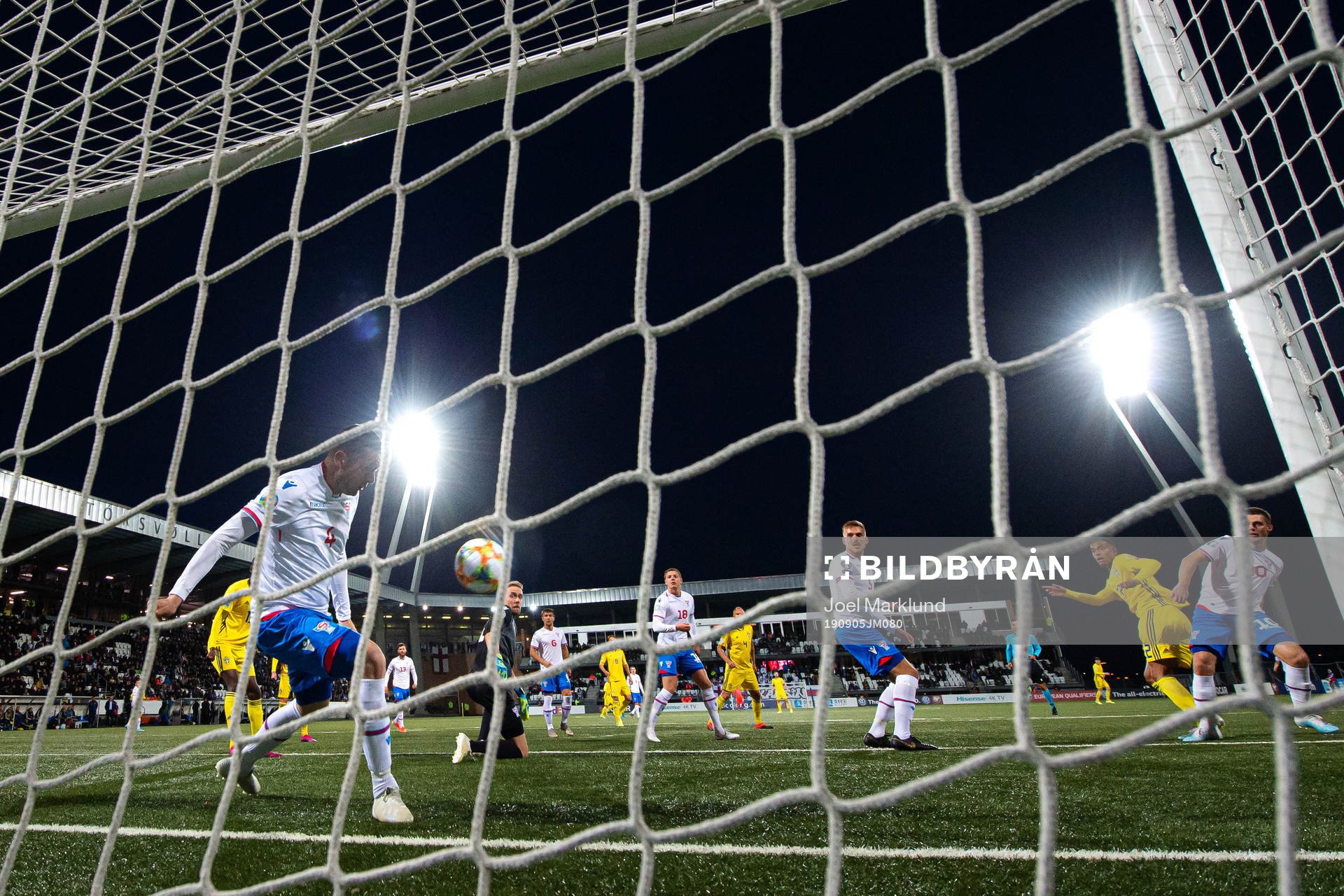 Atli Gregersen of Faroe Islands saves a shot from Robin