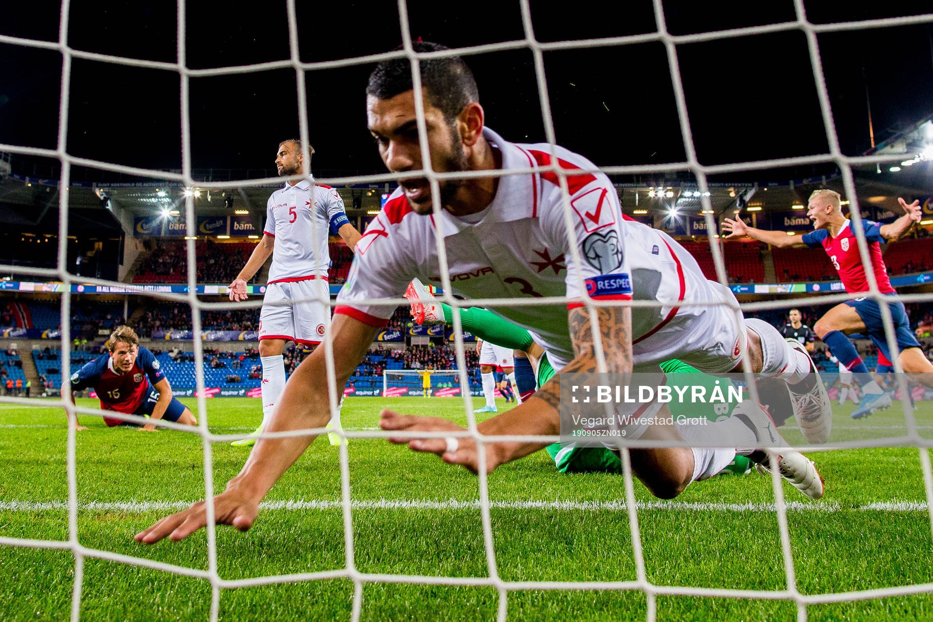 Sander Berge of Norway scores 1-0 as Ferdinando Apap of