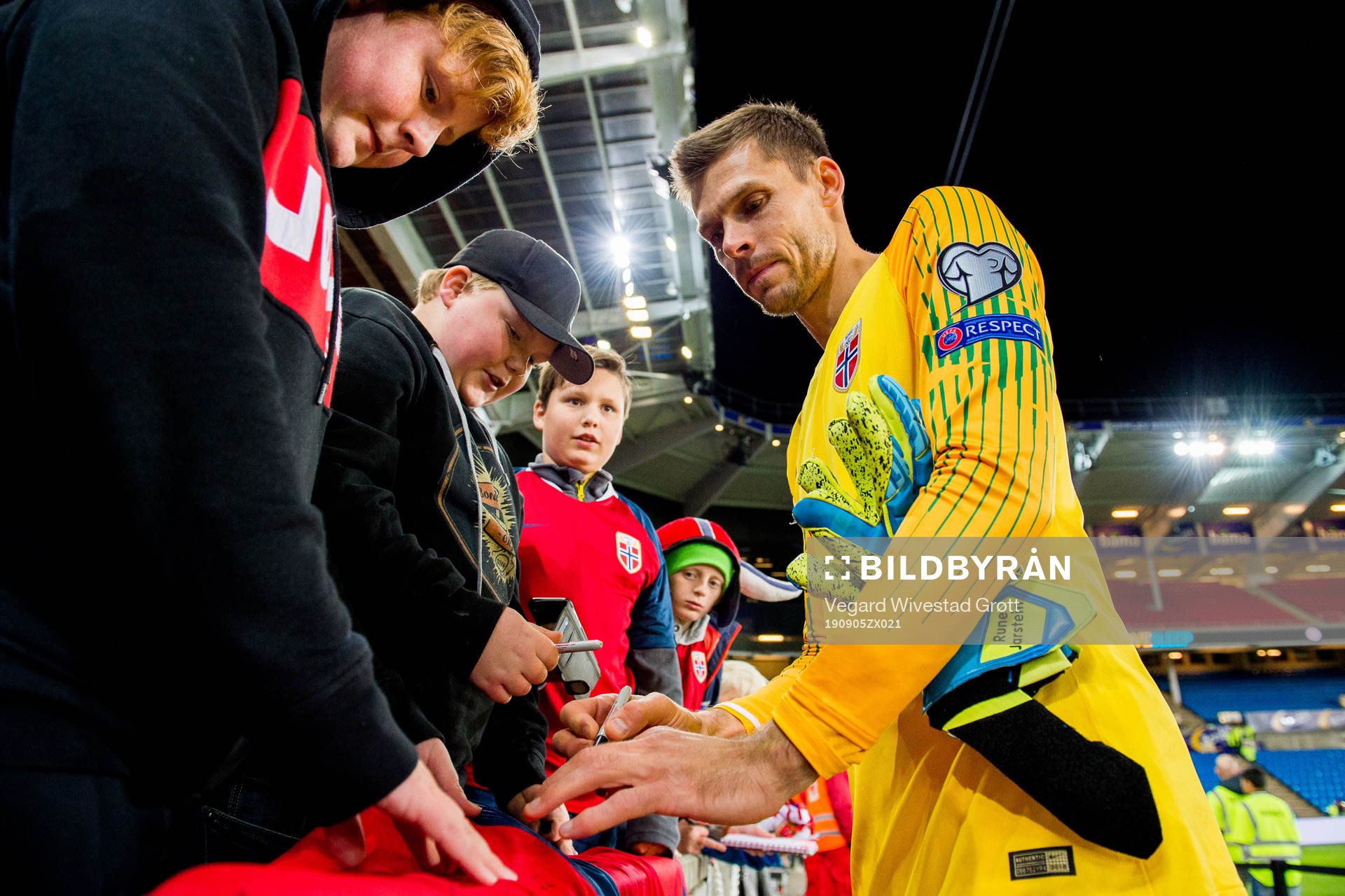 Goalkeeper Rune Almenning Jarstein of Norway signs
