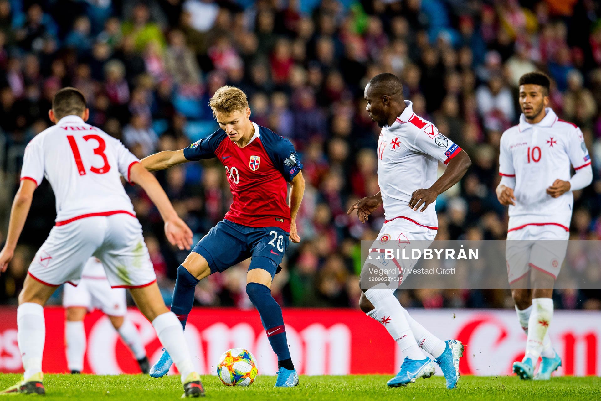 Martin Ødegaard of Norway and Alfred Effiong of Malta