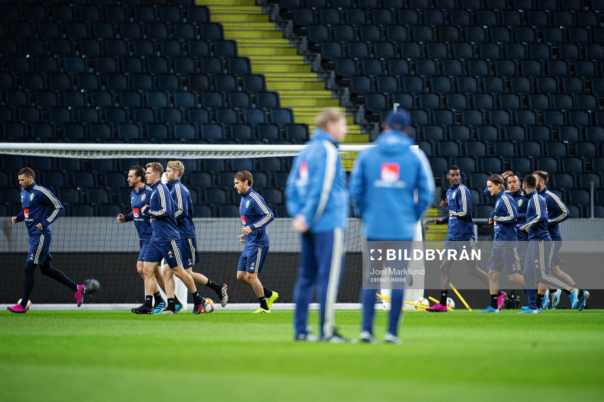 Players of the Swedish national football team warm up