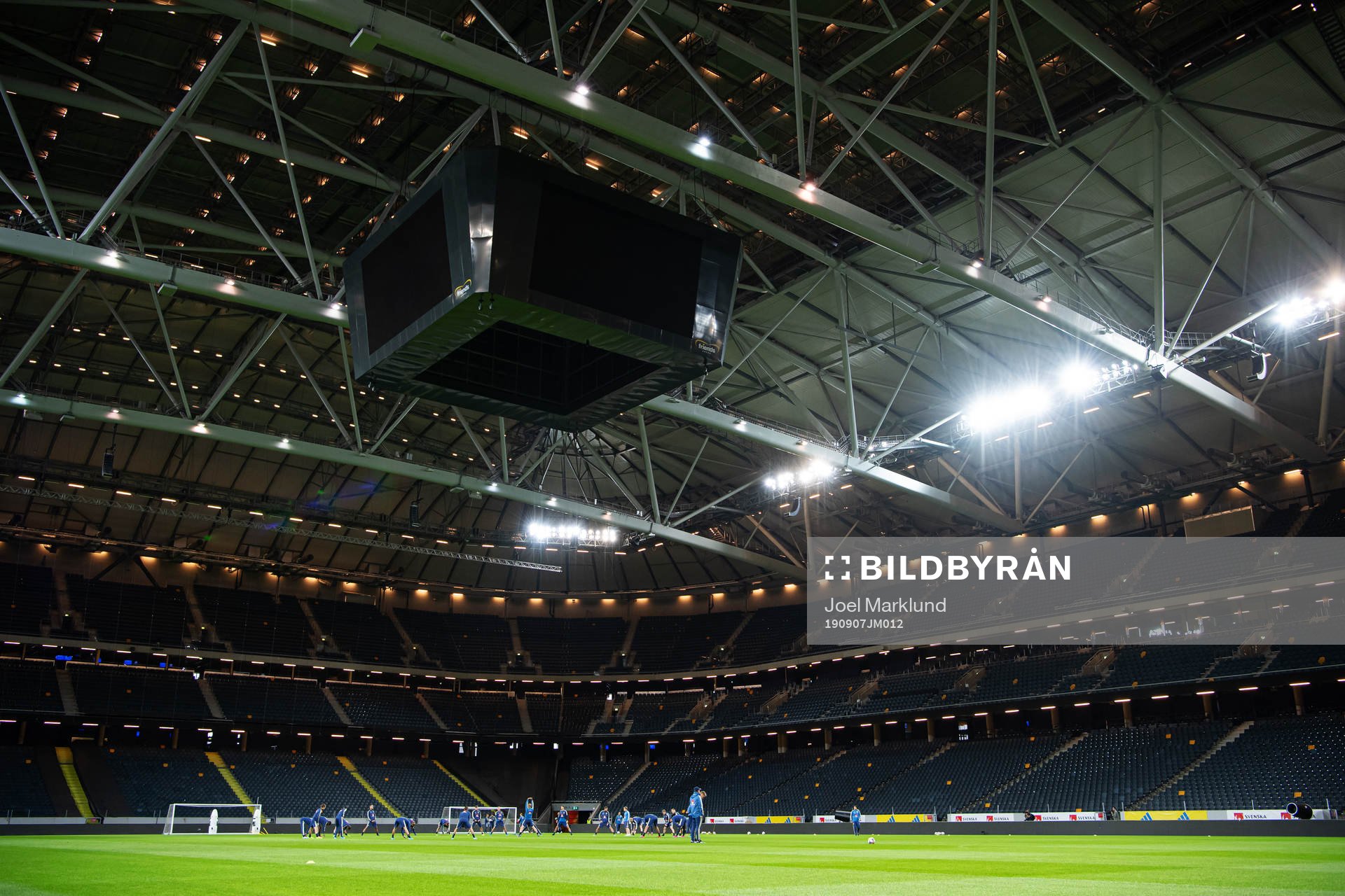 Players of the Swedish national football team warm up
