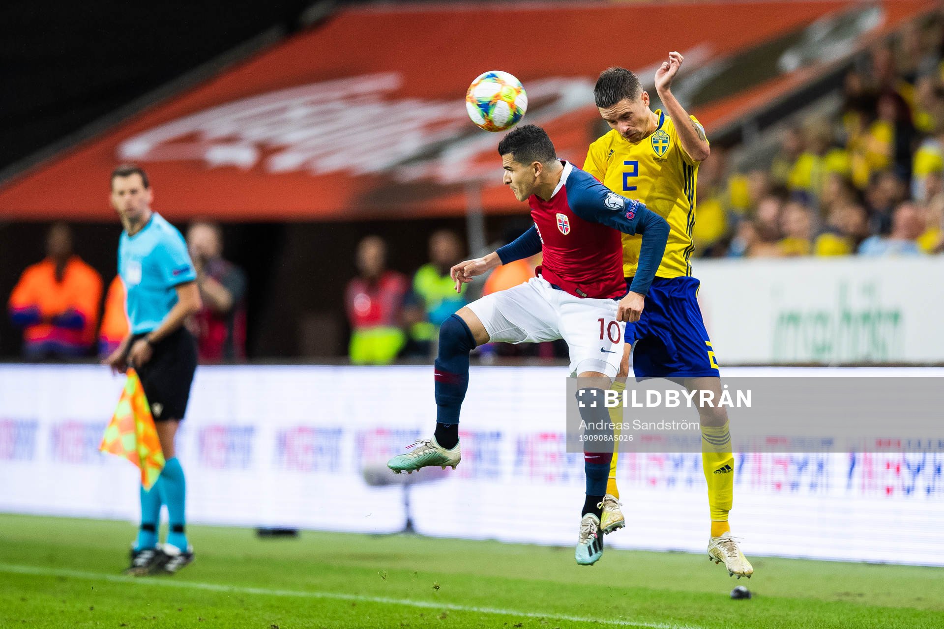 Tarik Elyounoussi of Norway and Mikael Lustig of Sweden