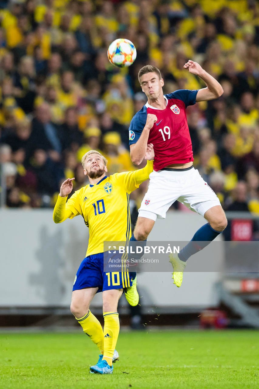 Emil Forsberg of Sweden battles for the ball with Markus