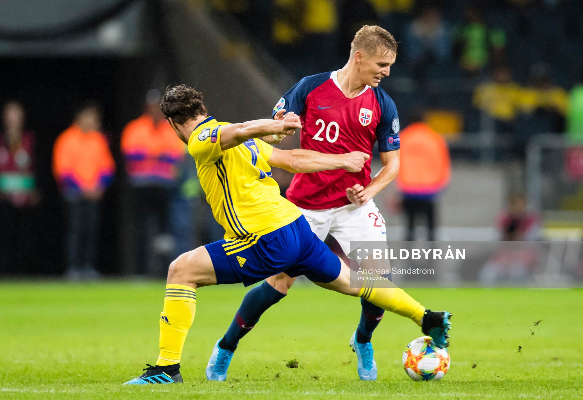 Gustav Svensson of Sweden battles for the ball with Martin