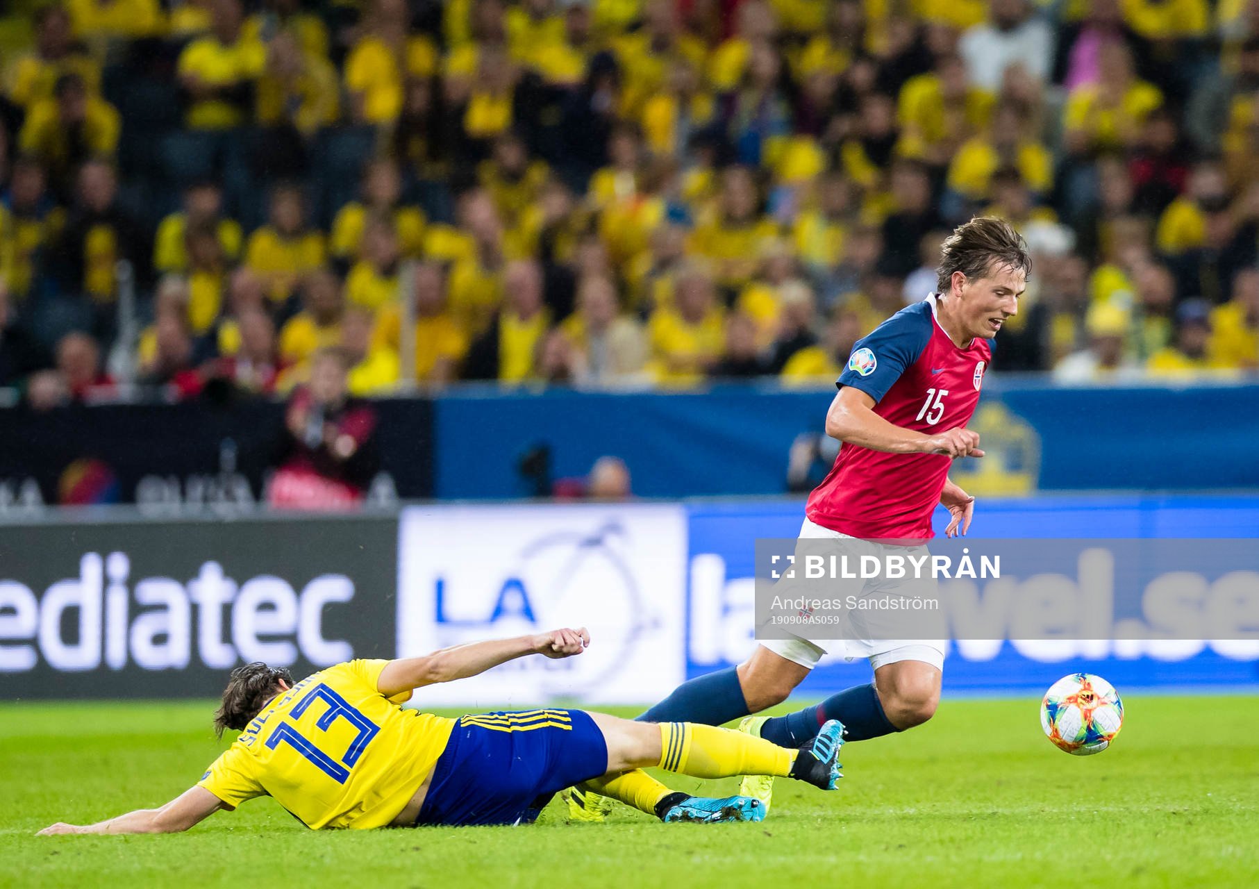 Gustav Svensson of Sweden battles for the ball with Sander