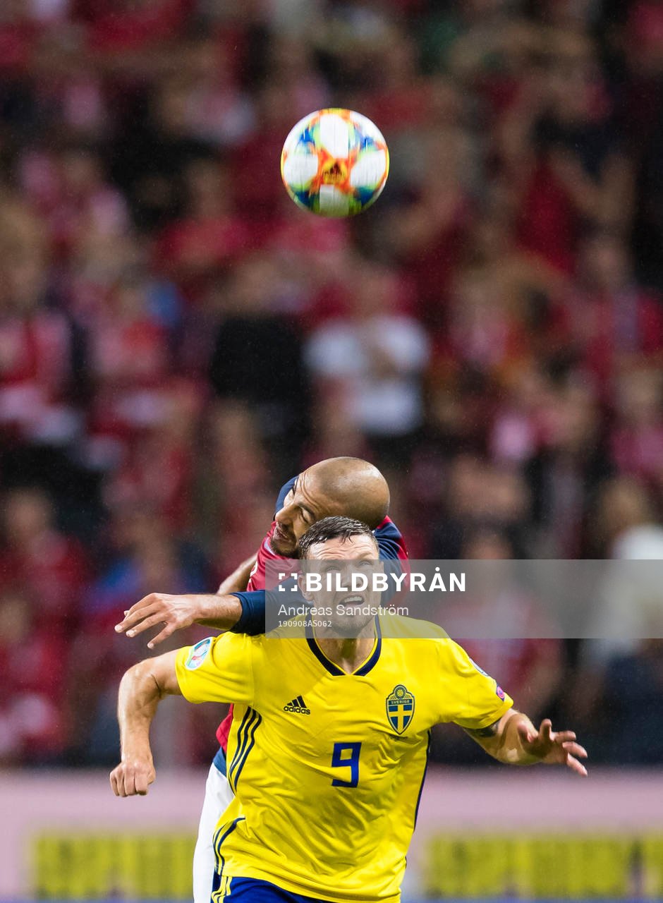 Marcus Berg of Sweden battles for the ball with Haitam