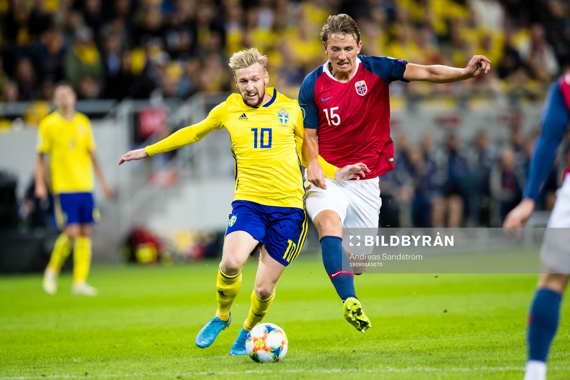 Emil Forsberg of Sweden battles for the ball with Sander
