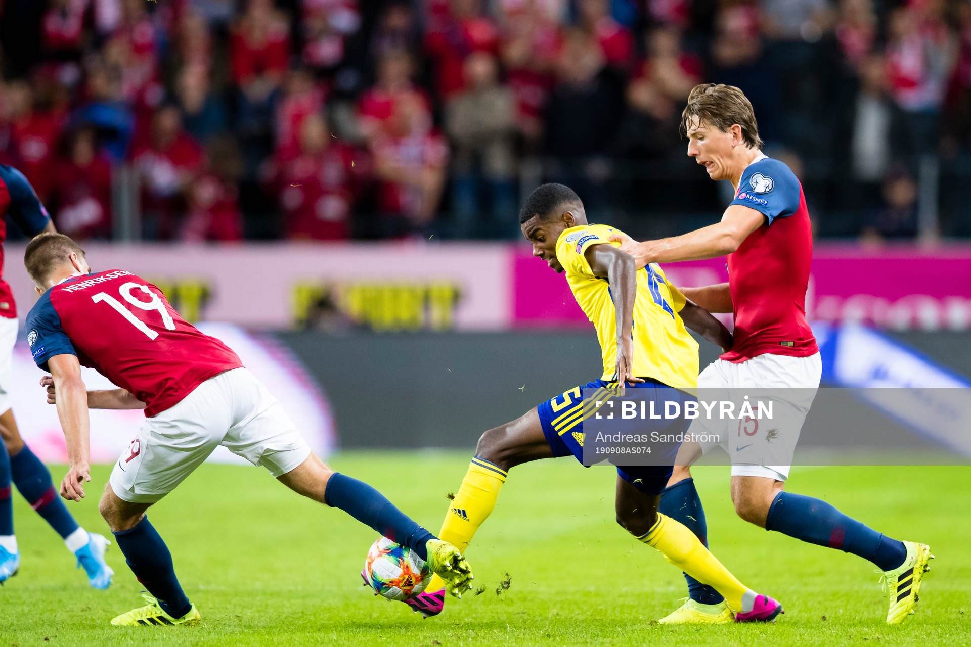 Alexander Isak of Sweden battles for the ball with Markus