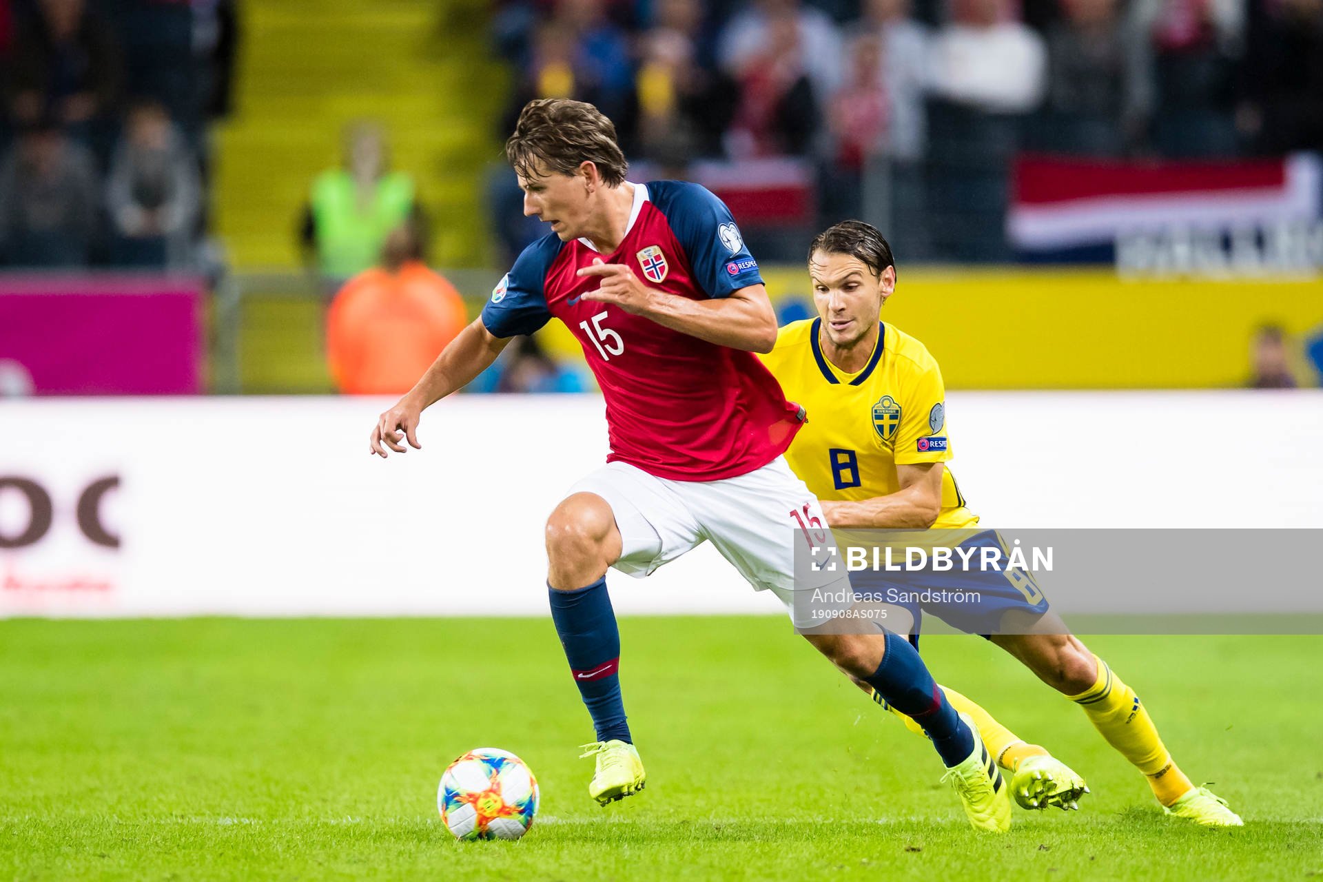 Sander Berge of Norway battles for the ball with  Albin