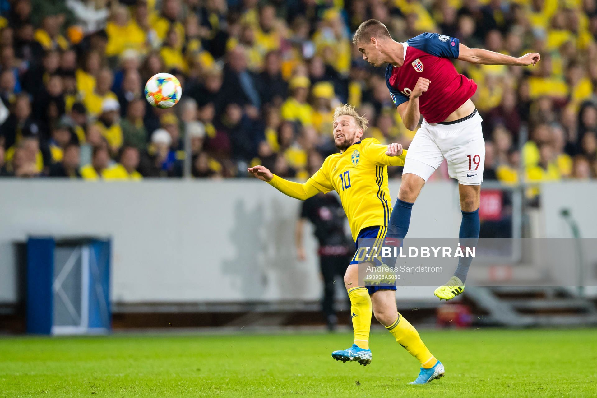 Emil Forsberg of Sweden battles for the ball with  Markus