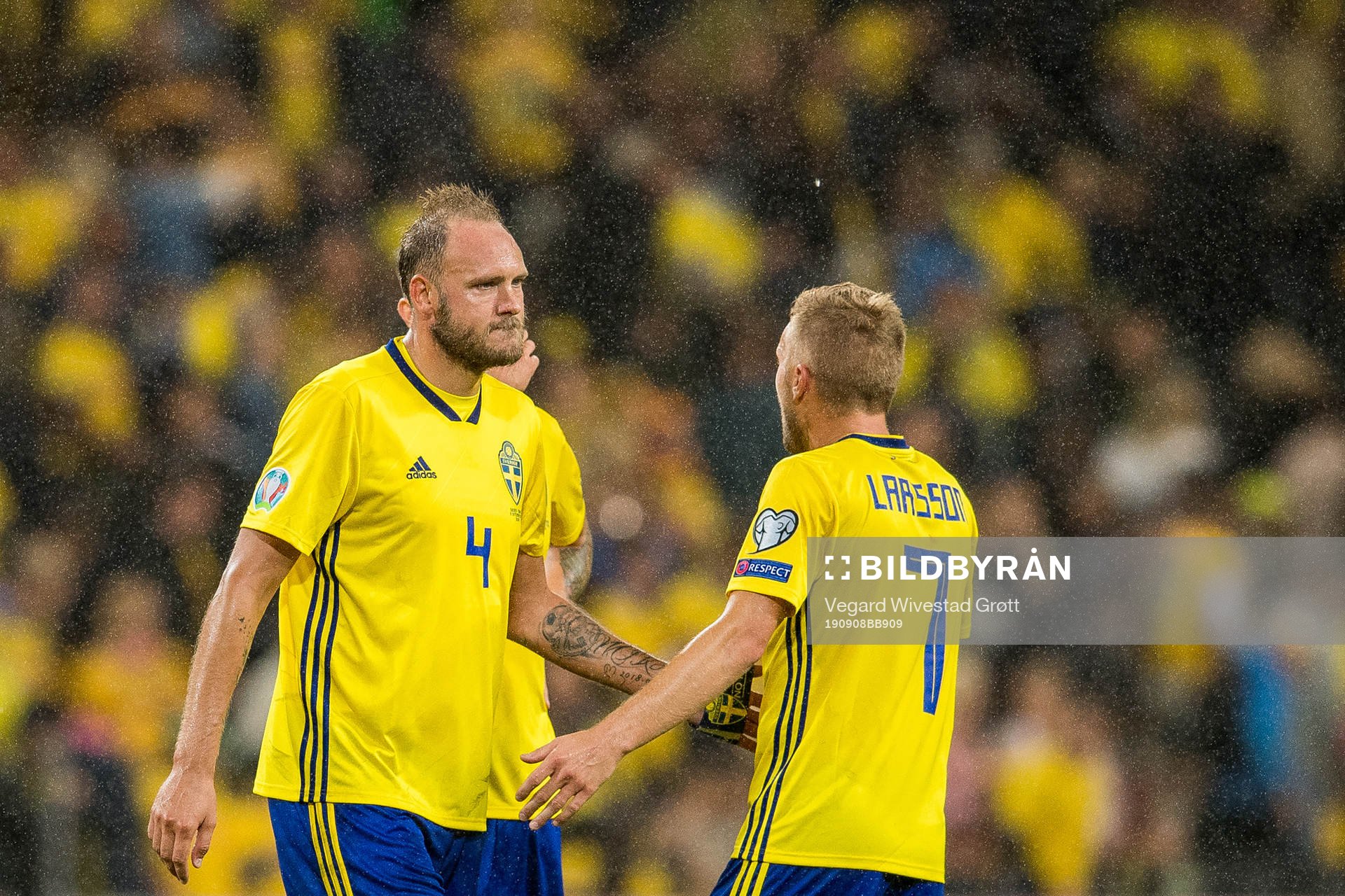 Andreas Granqvist and Sebastian Larsson of Sweden look