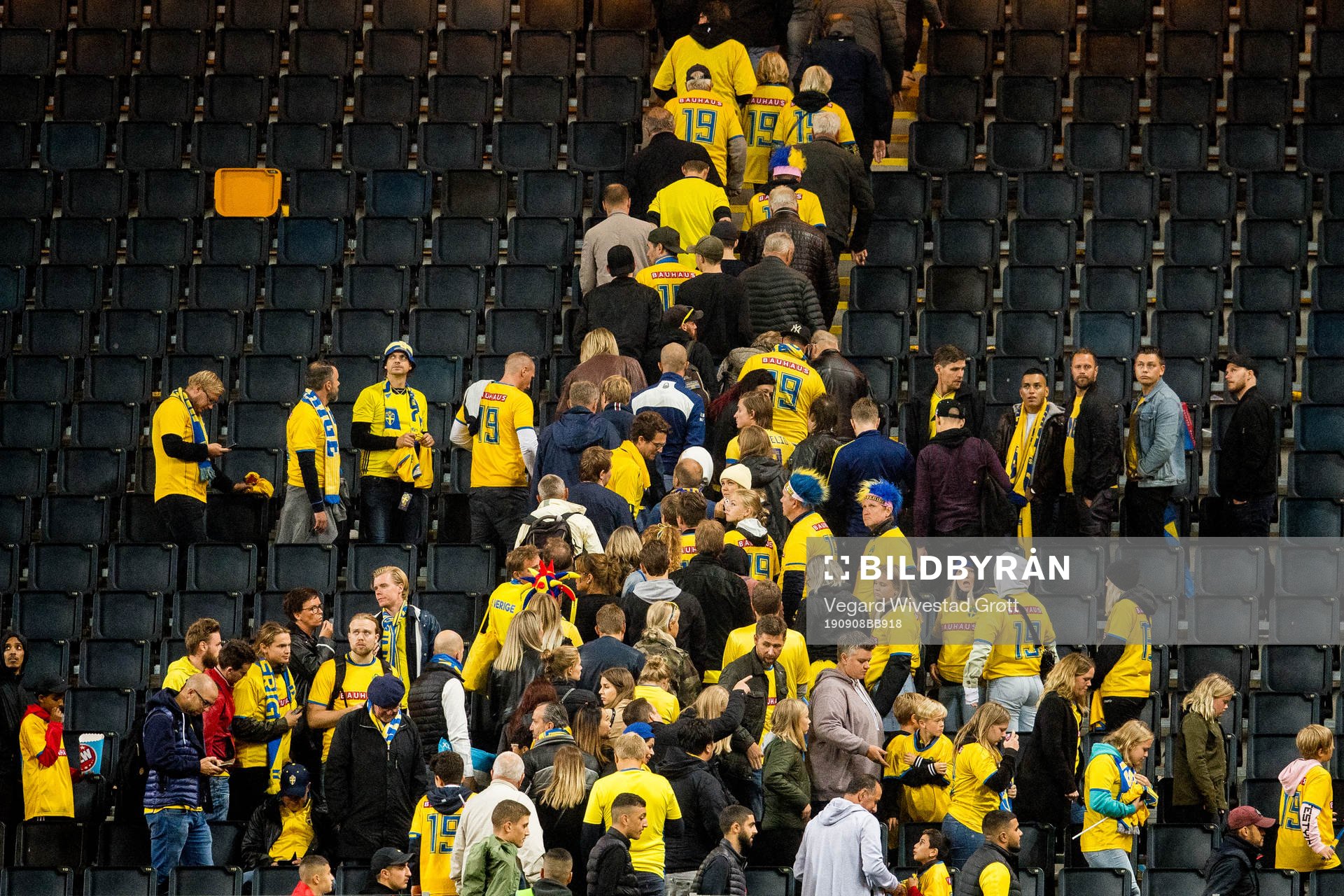 Fans of Sweden leave the stand
