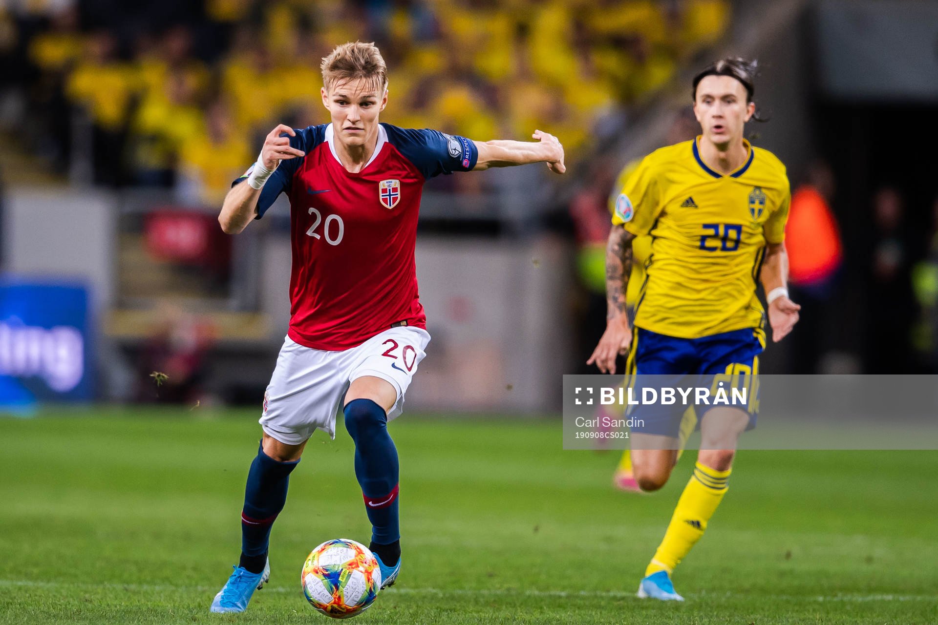 Martin Ødegaard of Norway and Kristoffer Olsson of Sweden