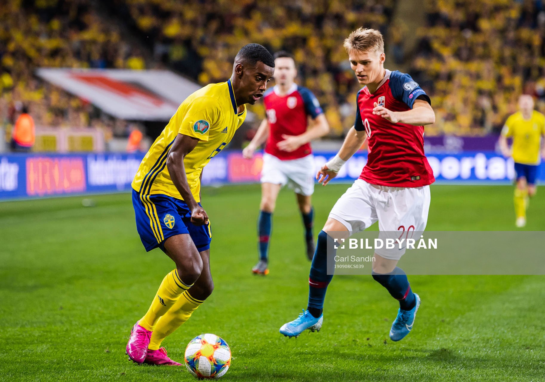 Alexander Isak of Sweden and Martin Ødegaard of Norway