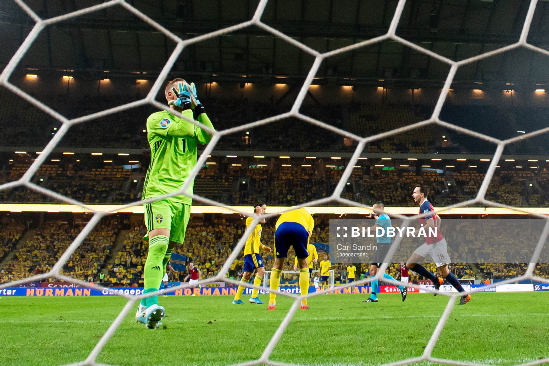 Goalkeeper Robin Olsen of Sweden looks dejected
