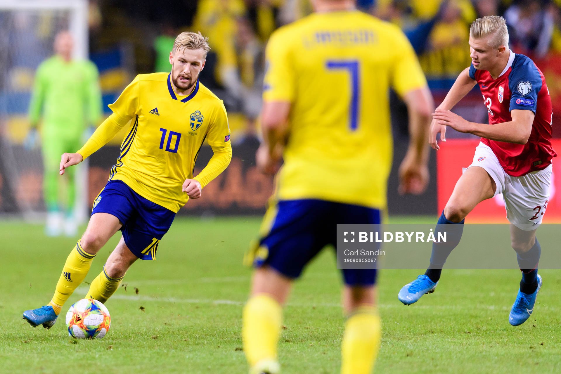 Emil Forsberg of Sweden and Erling Braut Haaland of Norway