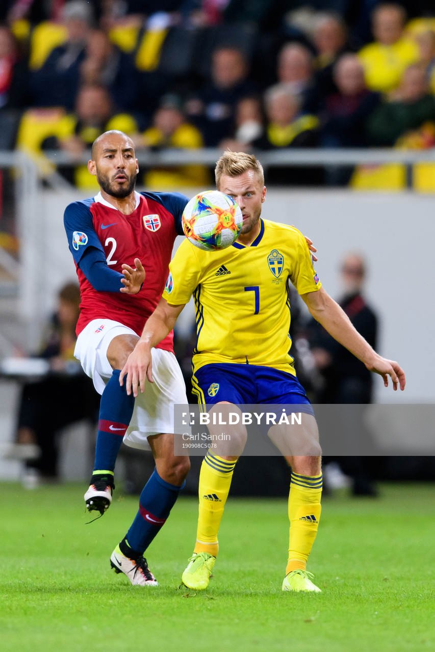 Haitam Aleesami of Norway and Sebastian Larsson of Sweden