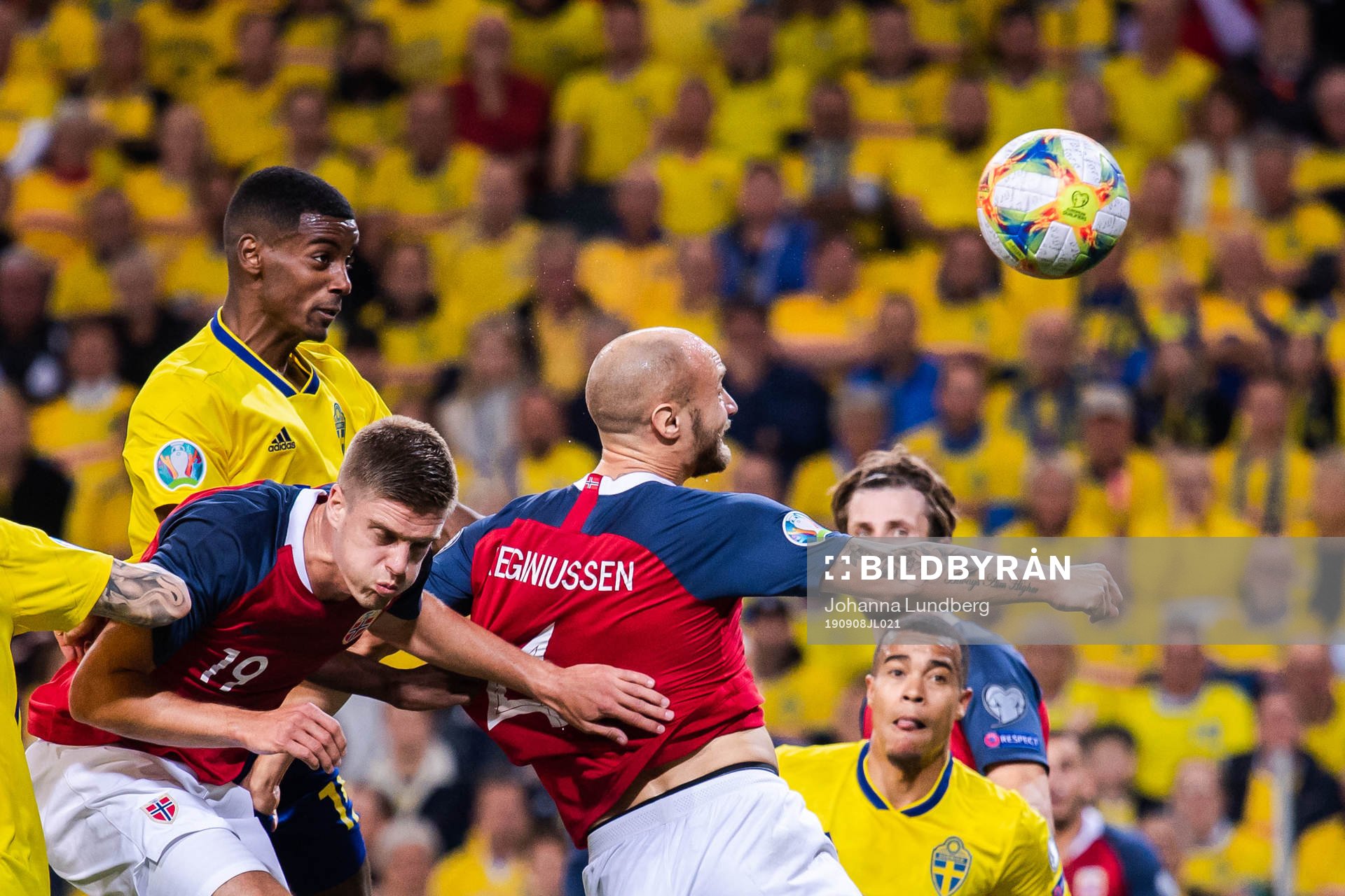 Alexander Isak of Sweden against Markus Henriksen and Tore