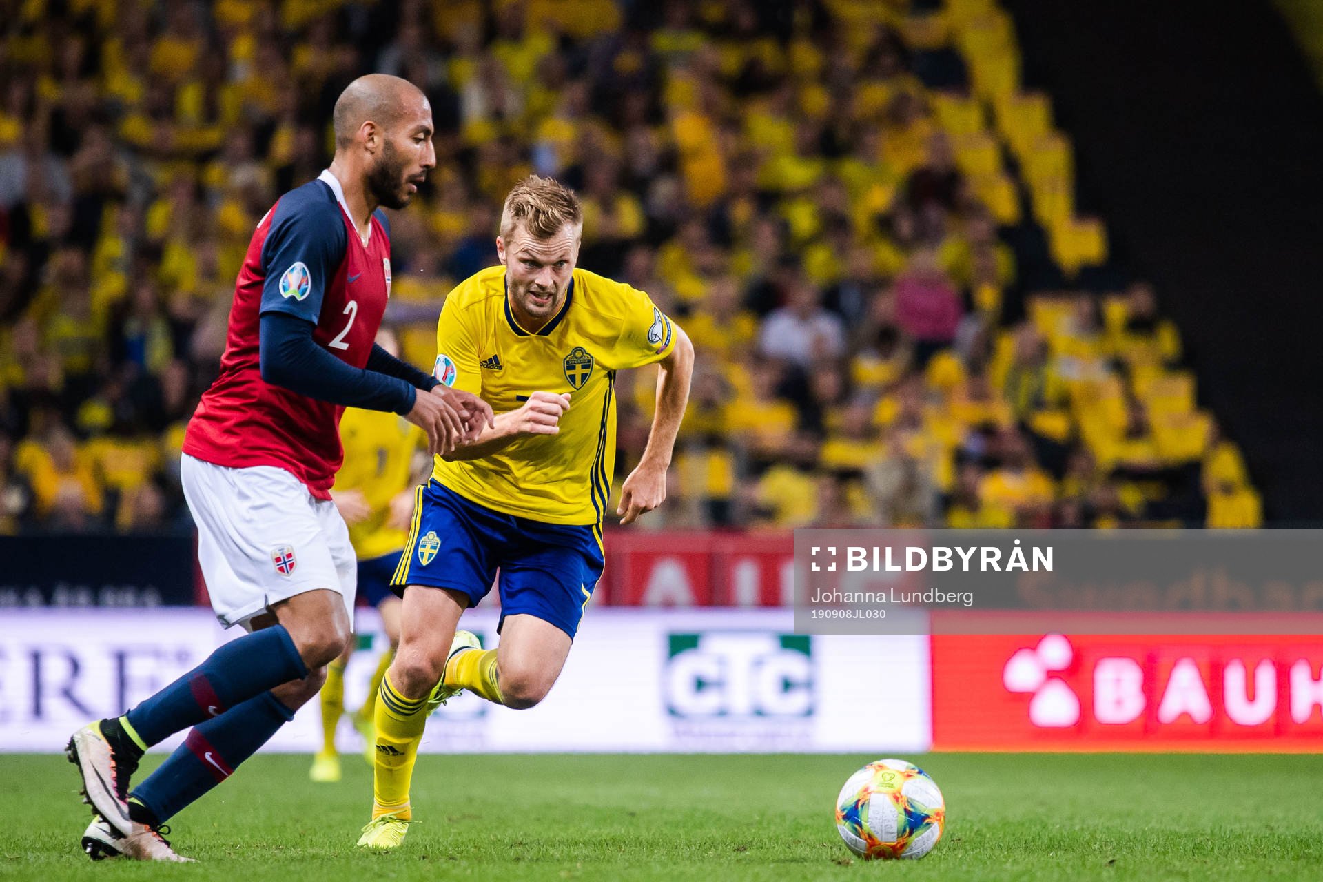 Haitam Aleesami of Norway and Sebastian Larsson of Sweden
