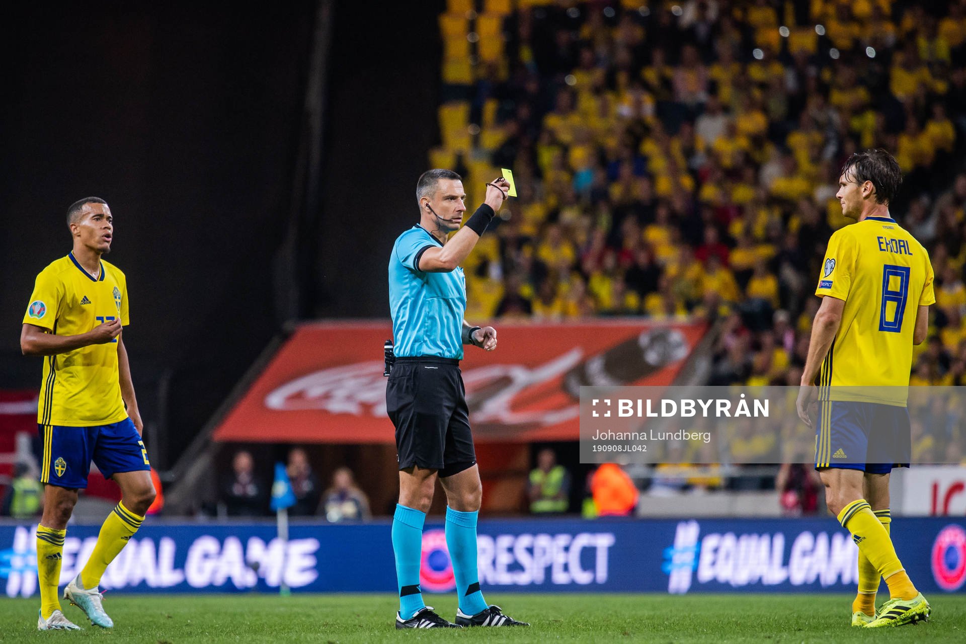 Albin Ekdal receives a varning from referee Slavko Vincic