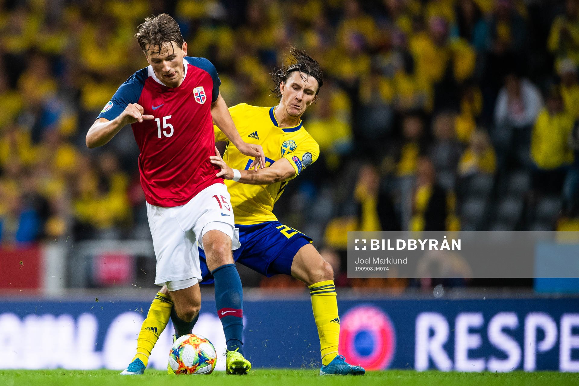 Sander Berge of Norway and Kristoffer Olsson of Sweden