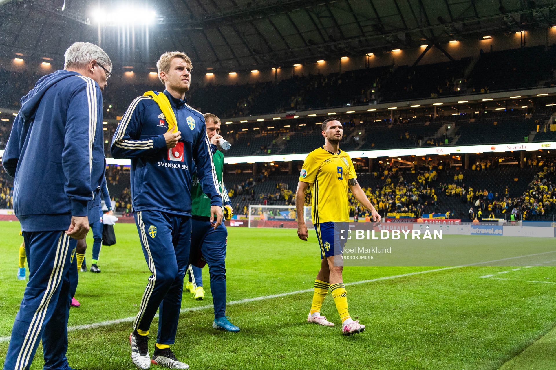 Filip Helander and Marcus Berg of Sweden look dejected as