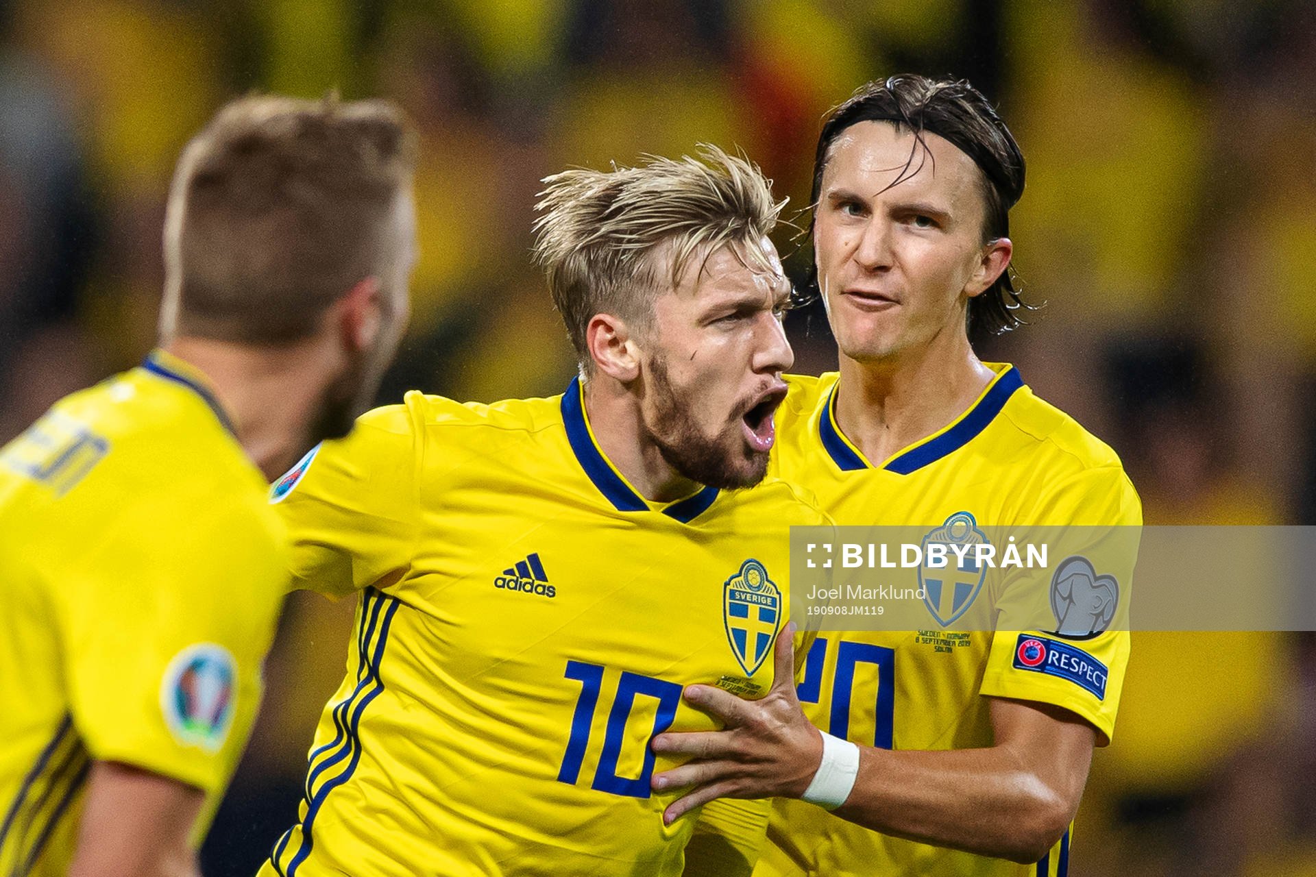 Emil Forsberg and Kristoffer Olsson of Sweden celebrate the
