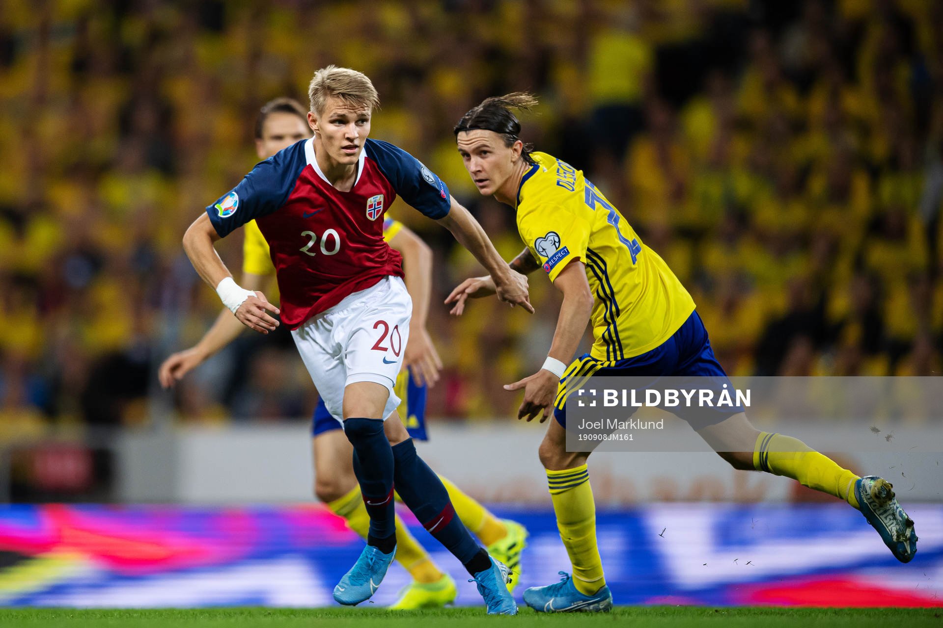 Martin Ødegaard of Norway and Kristoffer Olsson of Sweden