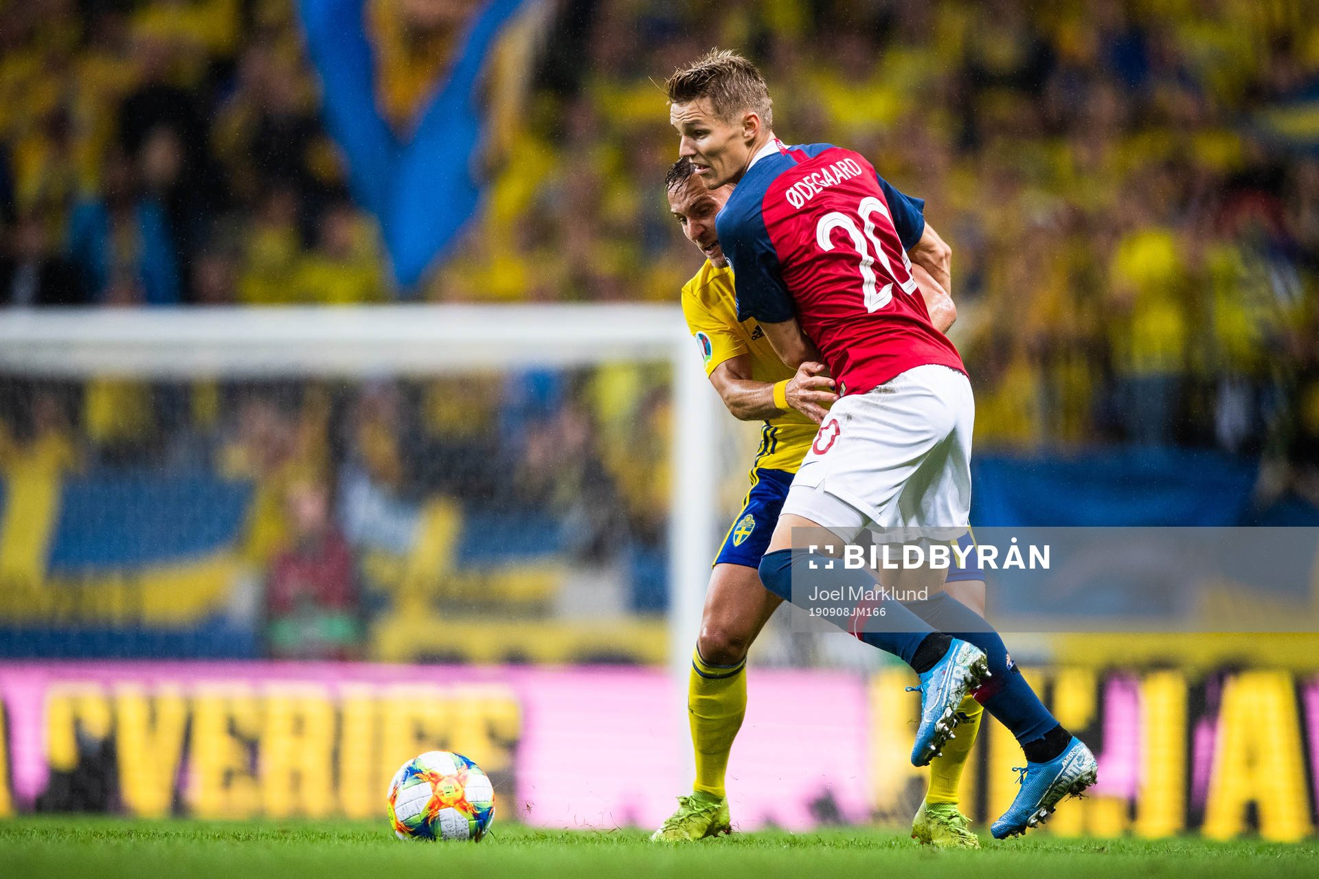 Pierre Bengtsson of Sweden compete for the ball with Martin