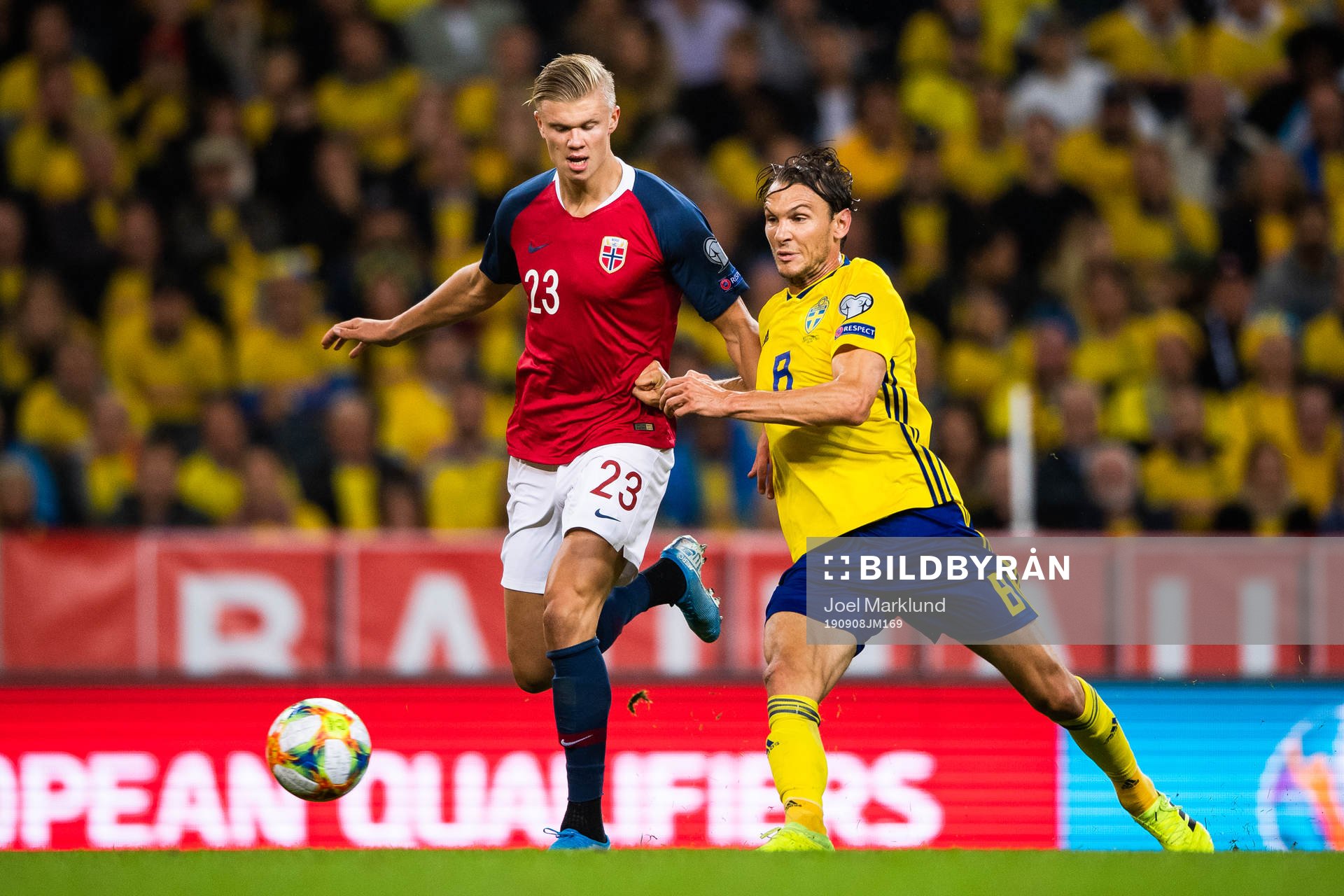 Erling Braut Haaland of Norway and Albin Ekdal of Sweden