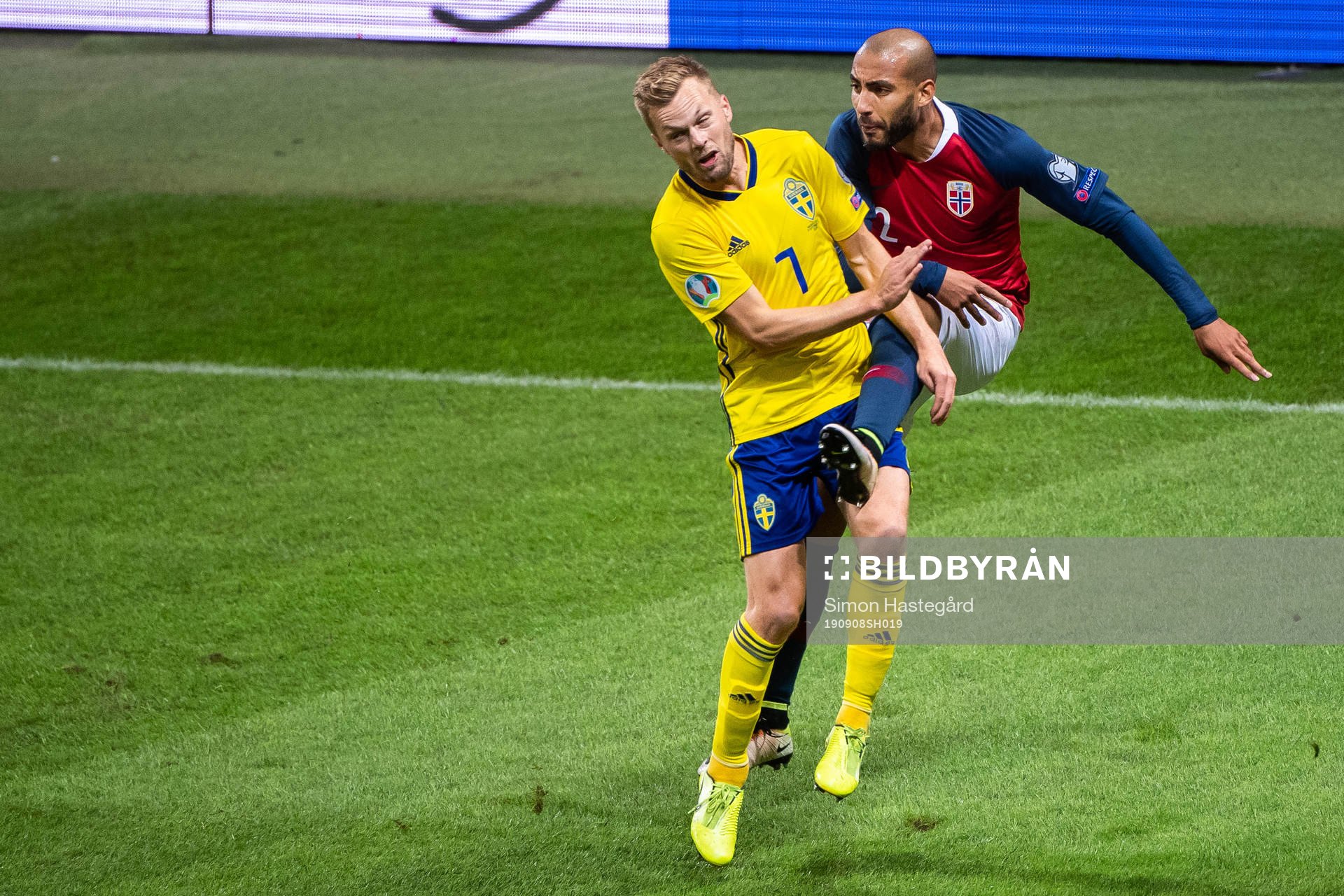 Sebastian Larsson of Sweden and Haitam Aleesami of Norway