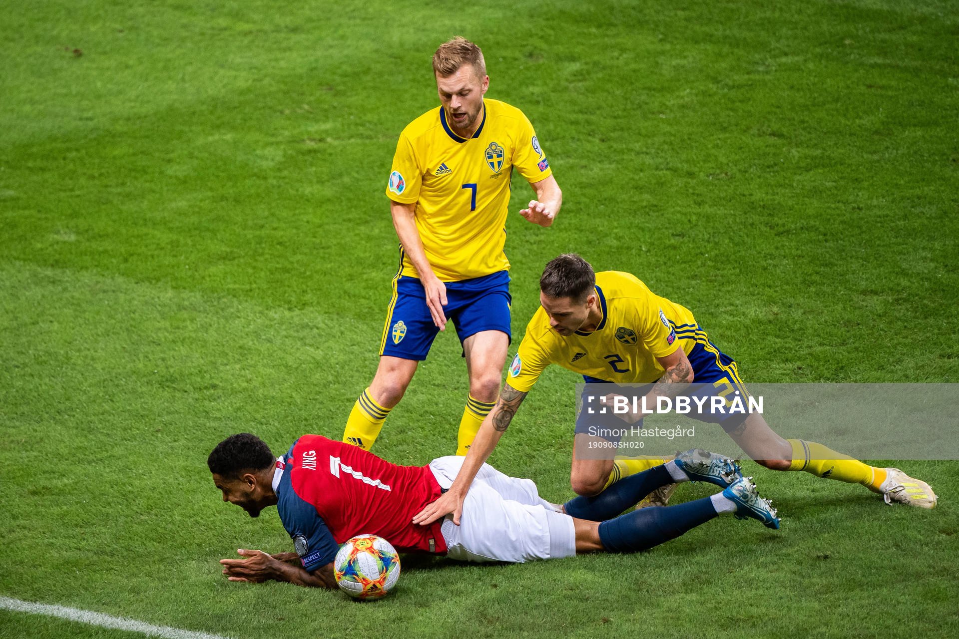 Joshua King of Norway in a duel with Sebastian Larsson and