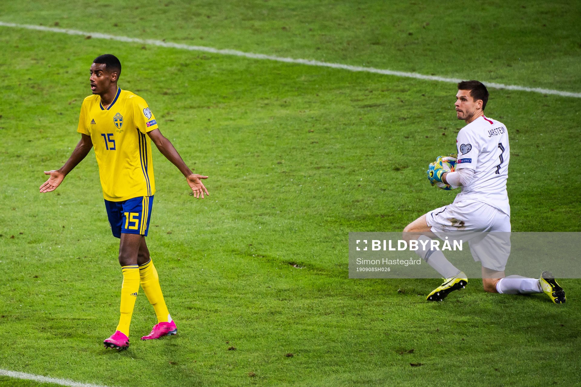 Alexander Isak of Sweden reacts and goalkeeper Rune