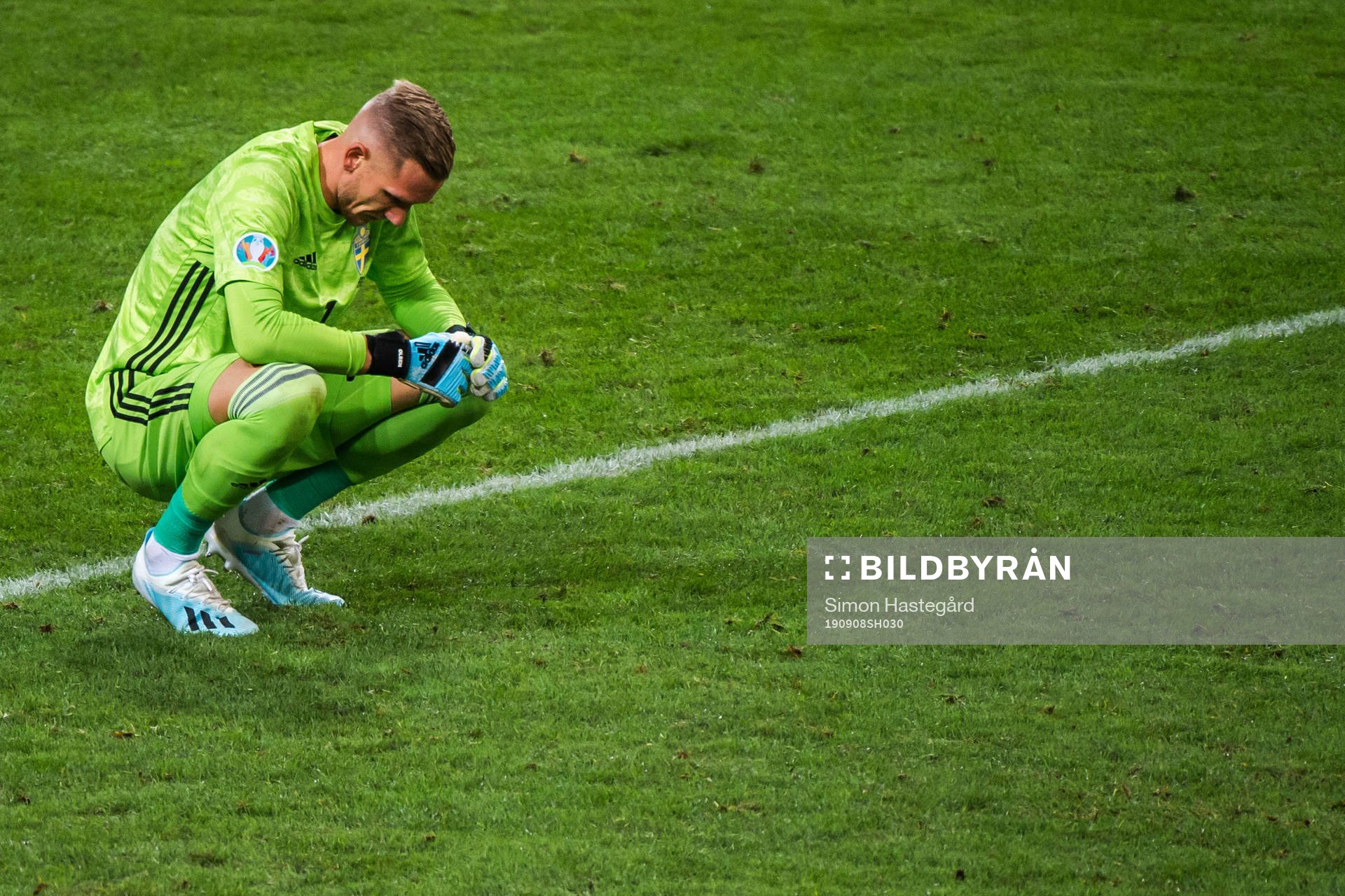 Goalkeeper Robin Olsen of Sweden looks dejected
