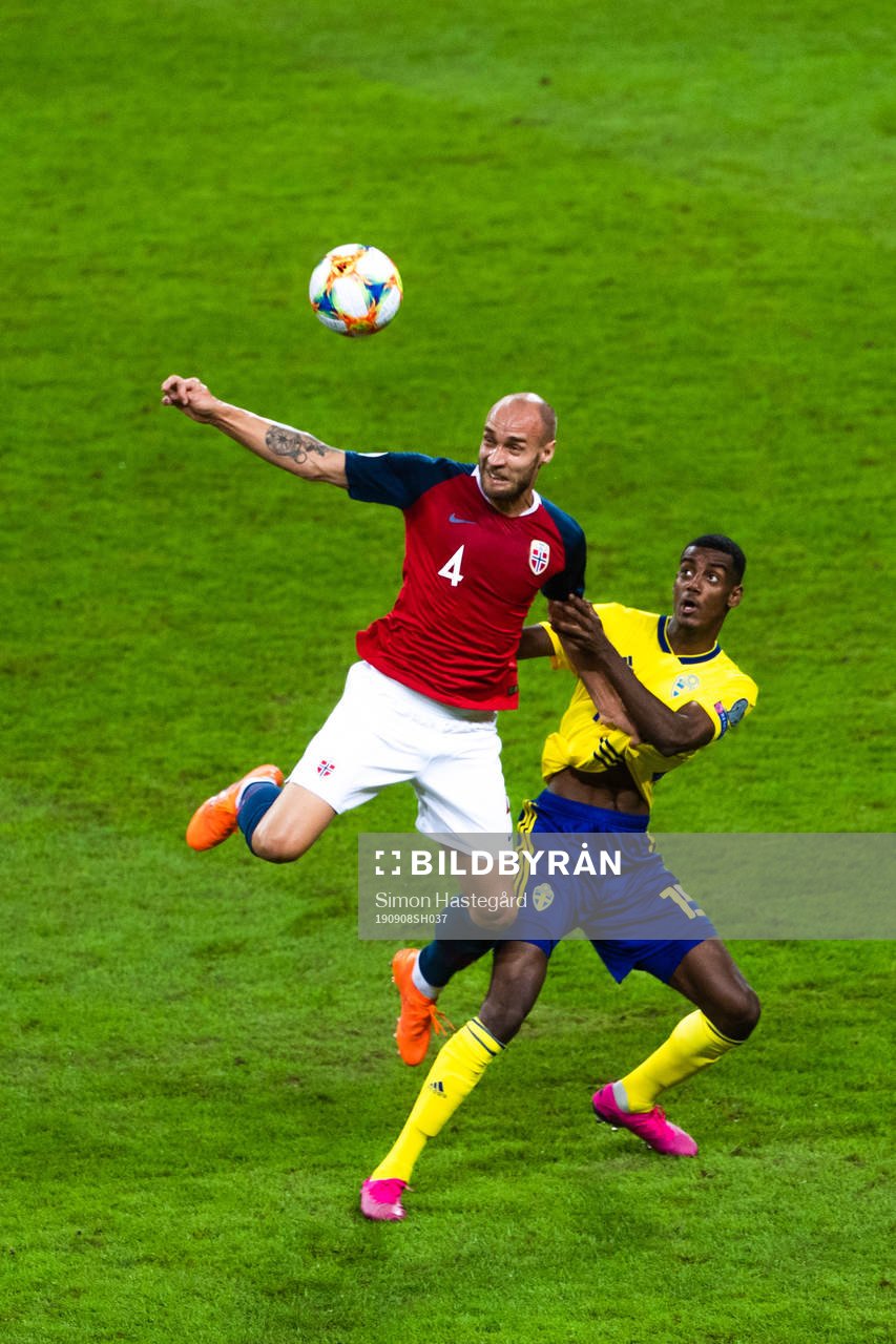 Tore Reginiussen of Norway and Alexander Isak of Sweden