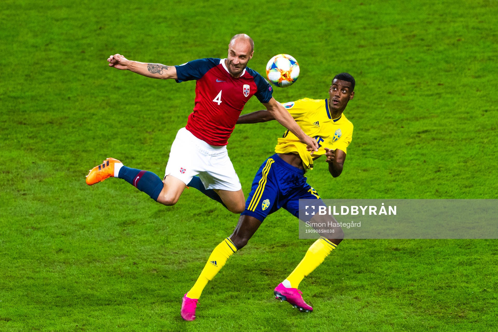 Tore Reginiussen of Norway and Alexander Isak of Sweden