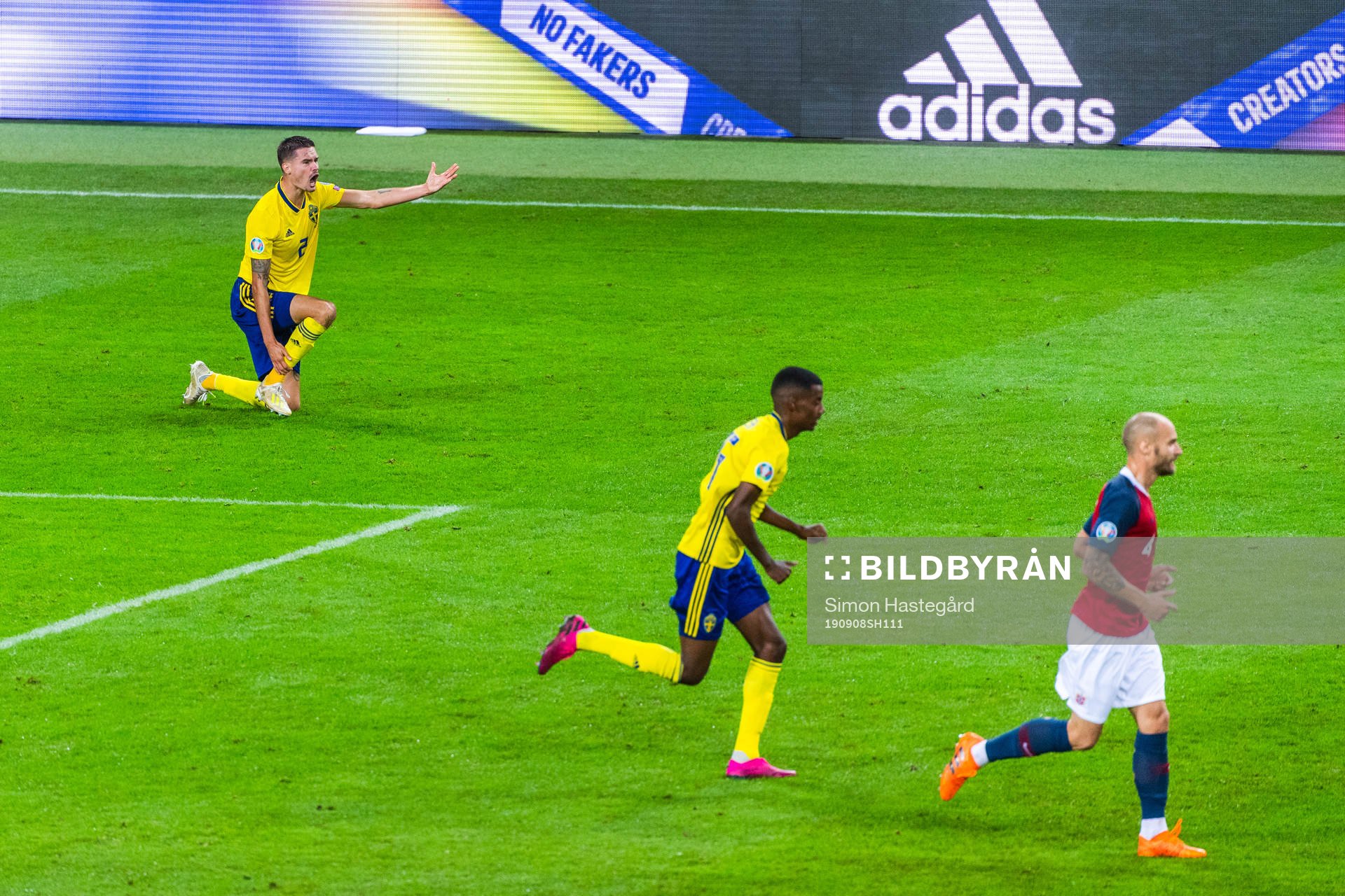 Mikael Lustig of Sweden reacts