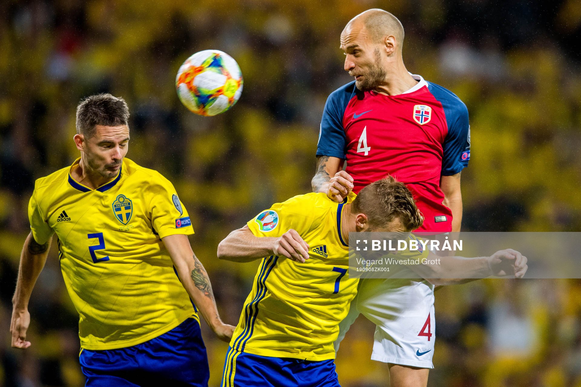 Mikael Lustig of Sweden, Sebastian Larsson of Sweden and