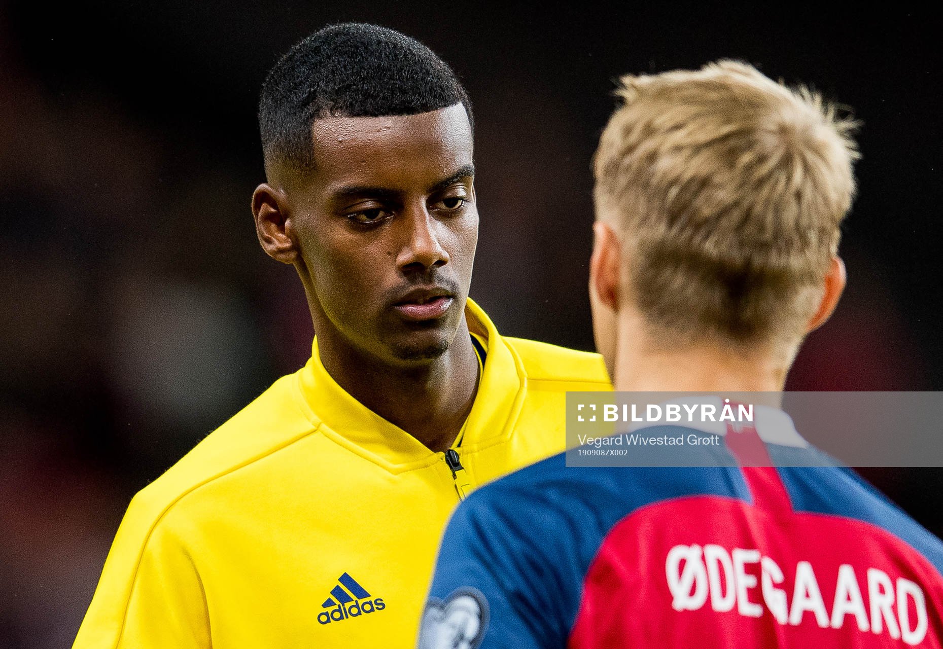 Alexander Isak of Sweden and Martin Ødegaard of Norway