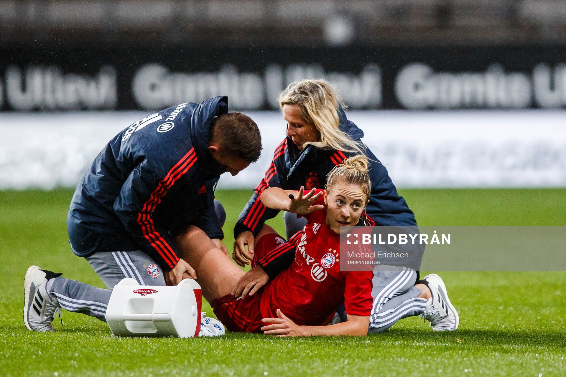 Carolin Simon  of Bayern Munich receives medical treatment