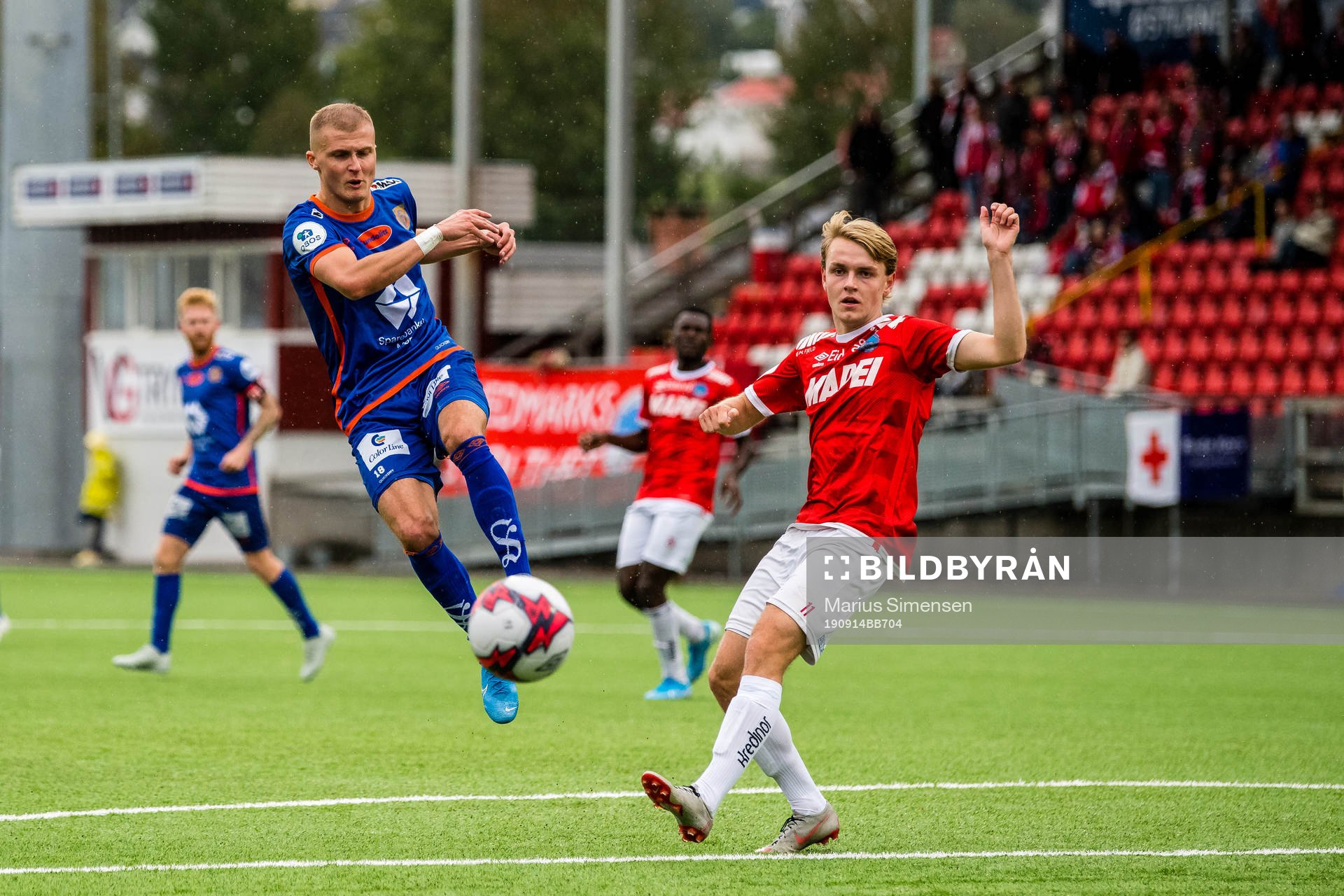 David Kristjan Olafsson of Aalesund and Bo Simon Penny